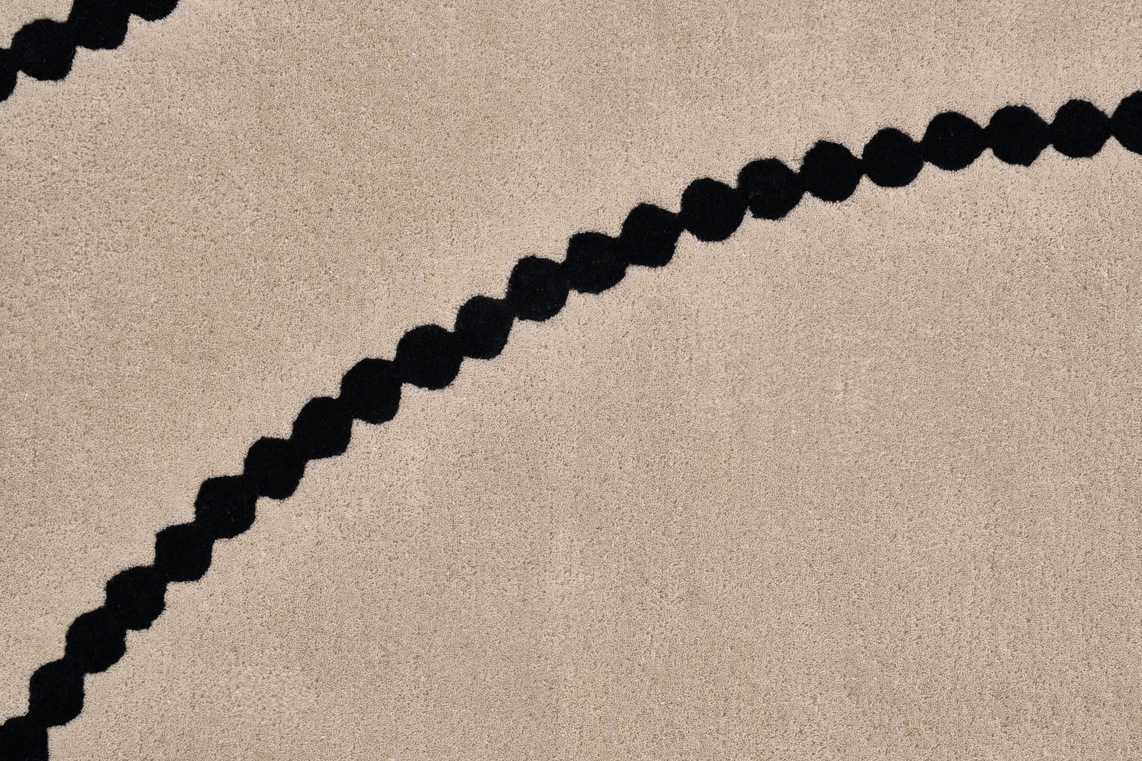 LUNA Beige Carpet with Black Pattern