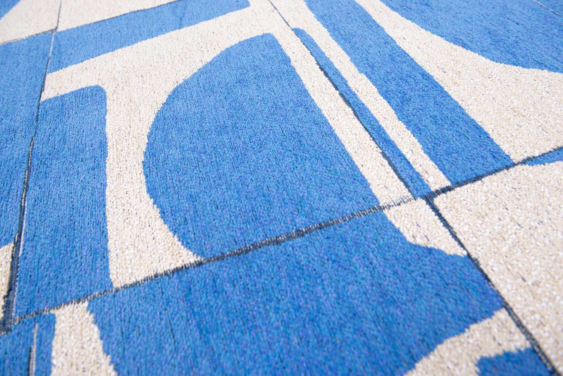 Kruhový koberec PAPERCUT CAMPANULA modrý