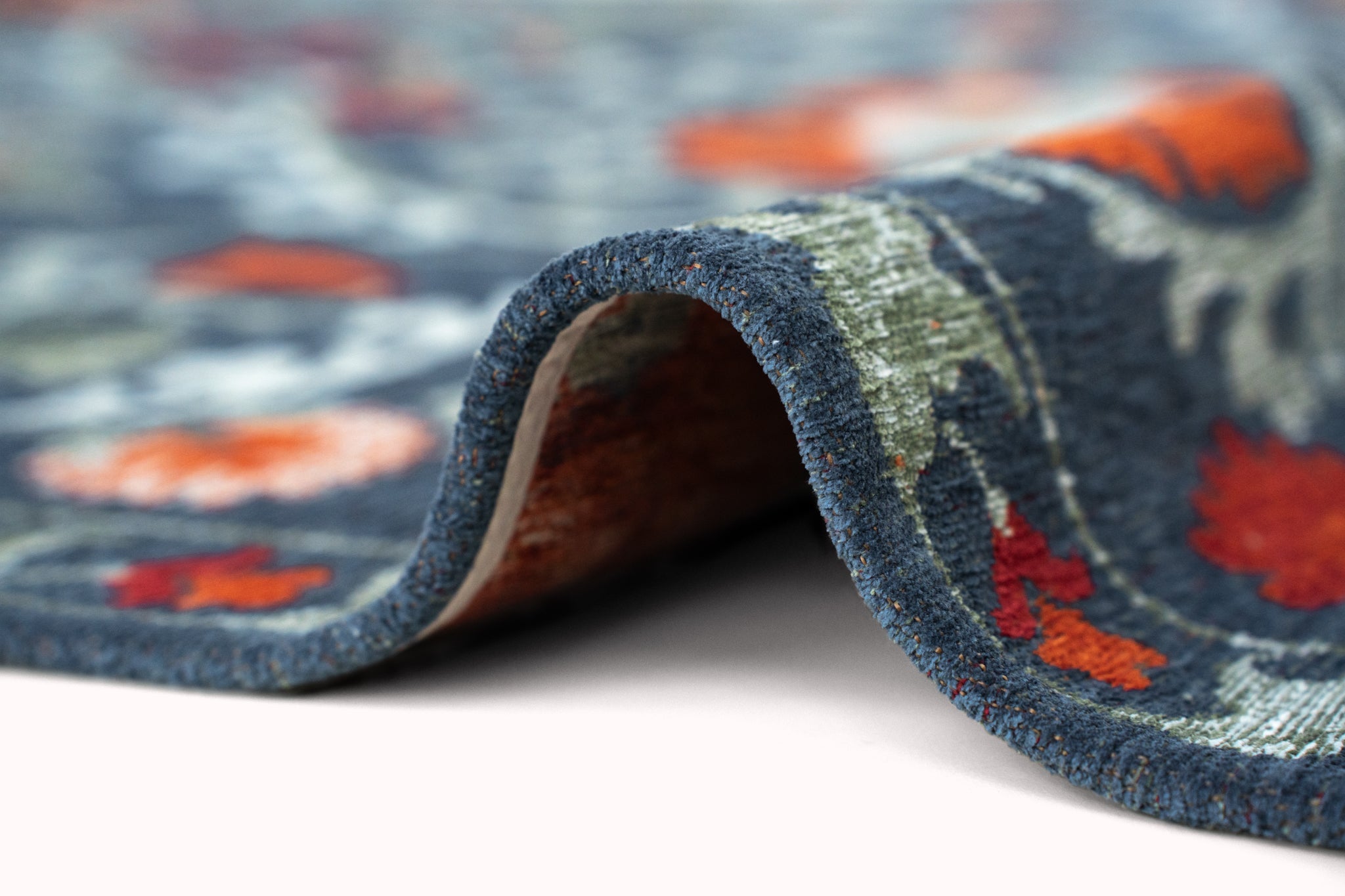 Koberec SUZANI NORDIC modrý so sivou a oranžovou