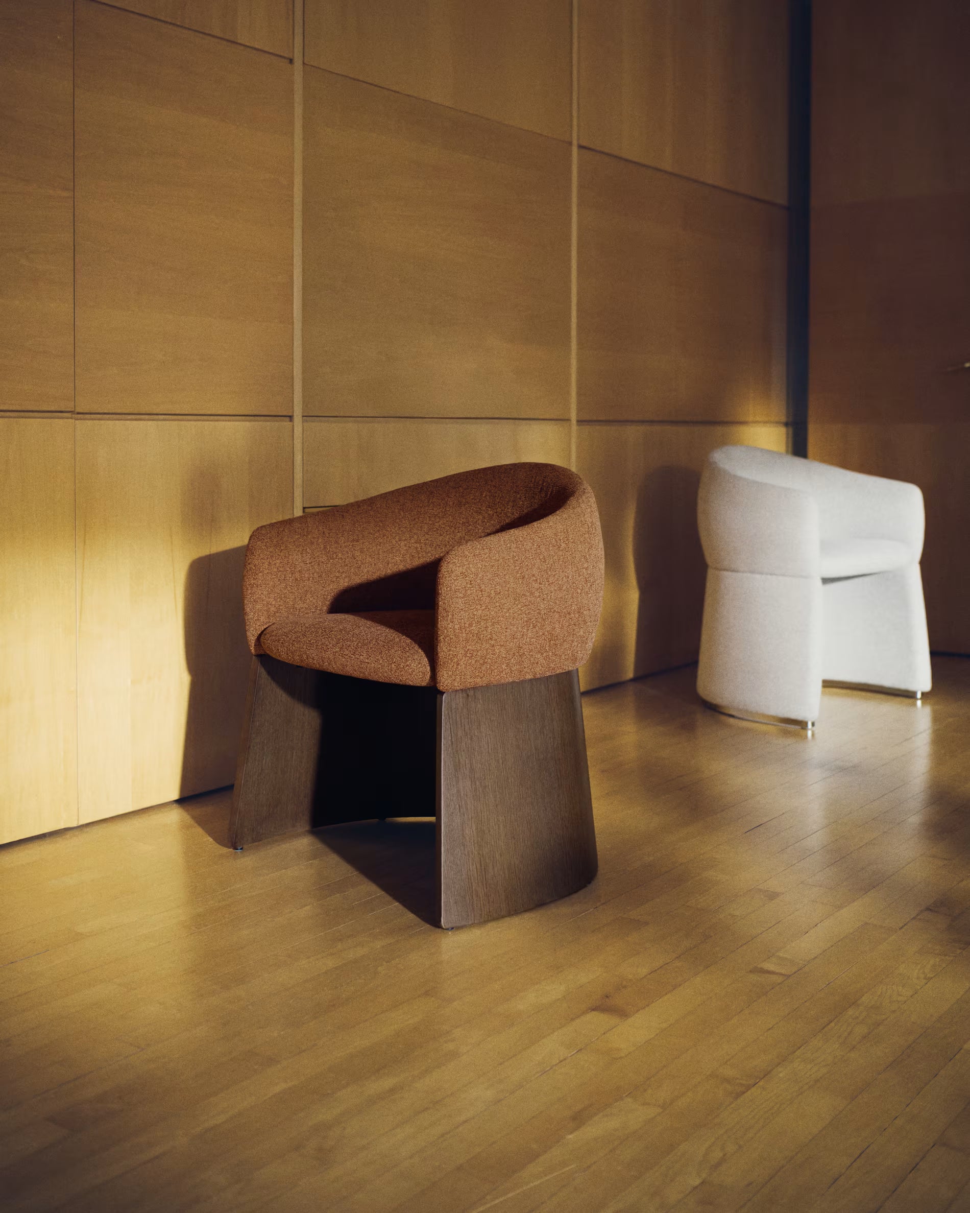 BOSCA chair in brick-colored chenille with a walnut veneer base