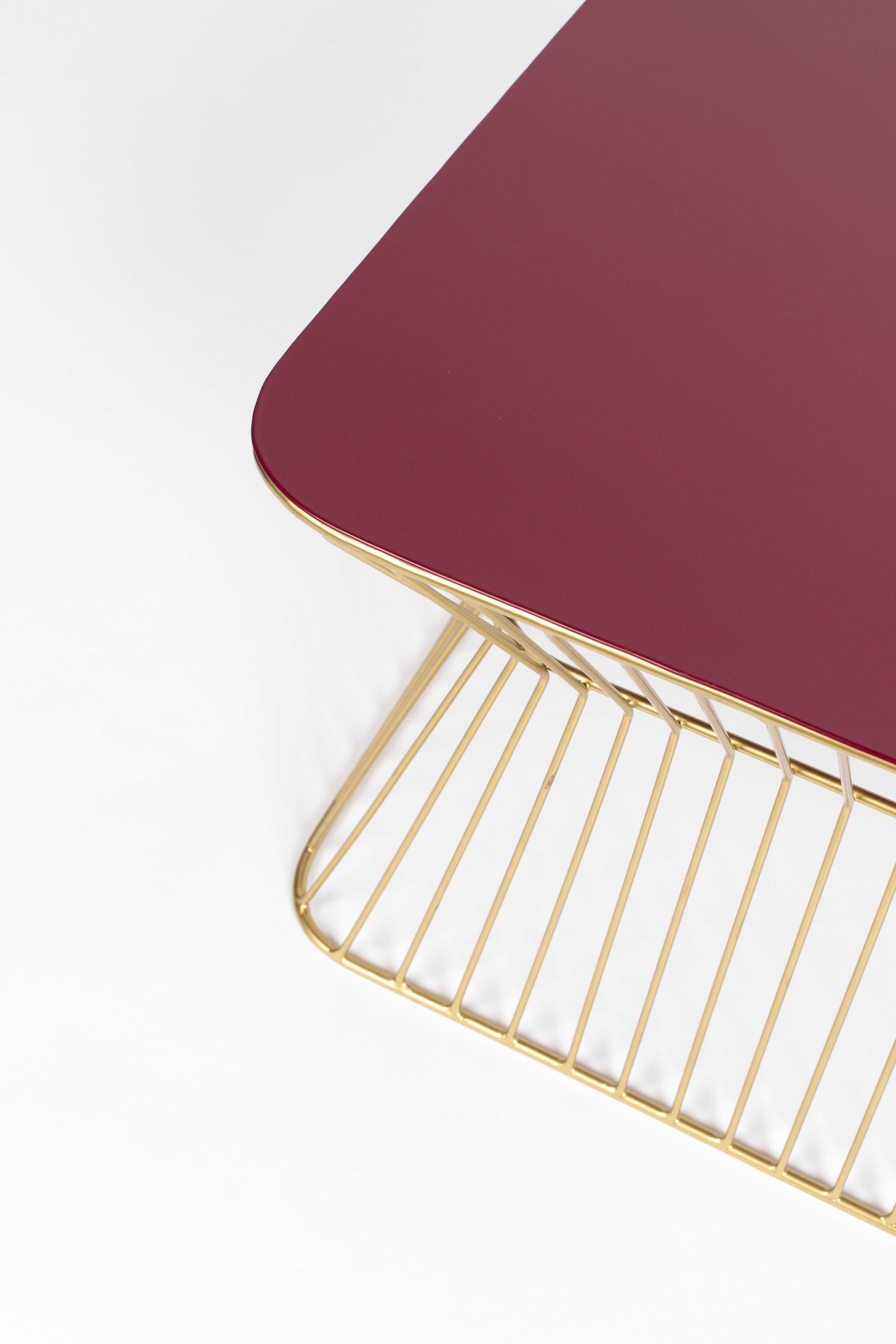 NO OFFENCE wine coffee table with a gold base