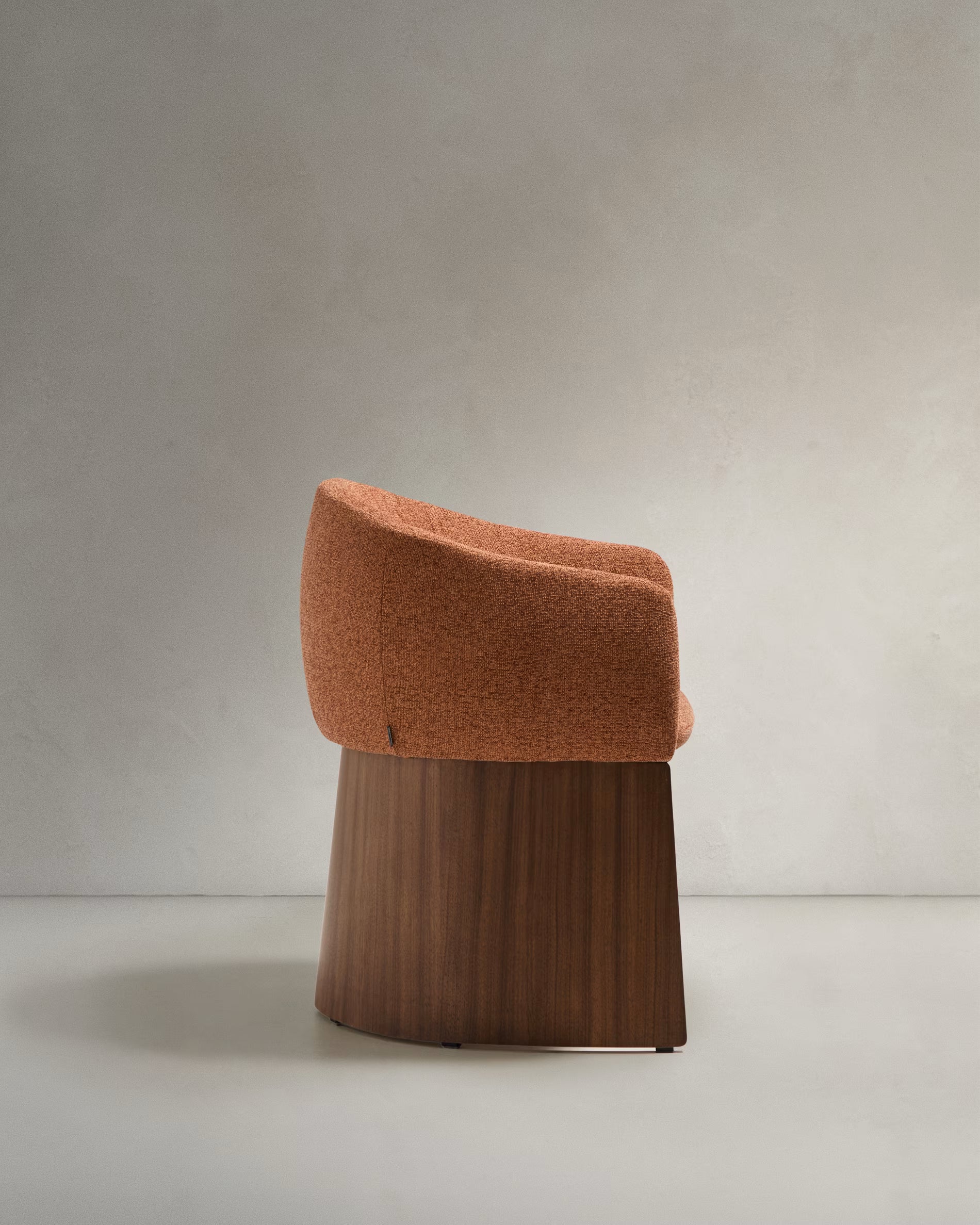 BOSCA chair in brick-colored chenille with a walnut veneer base
