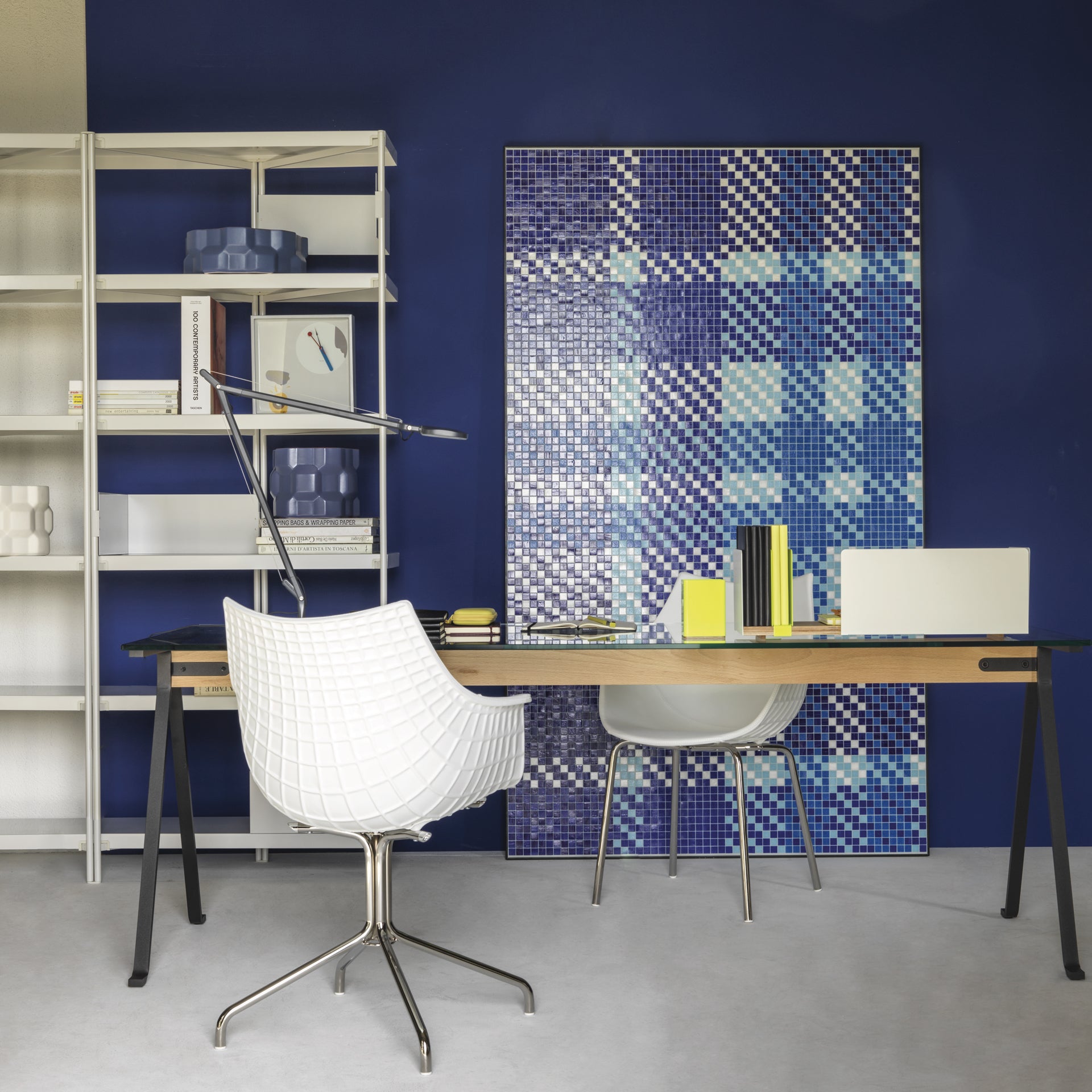 A transparent meridiana chair with a black base