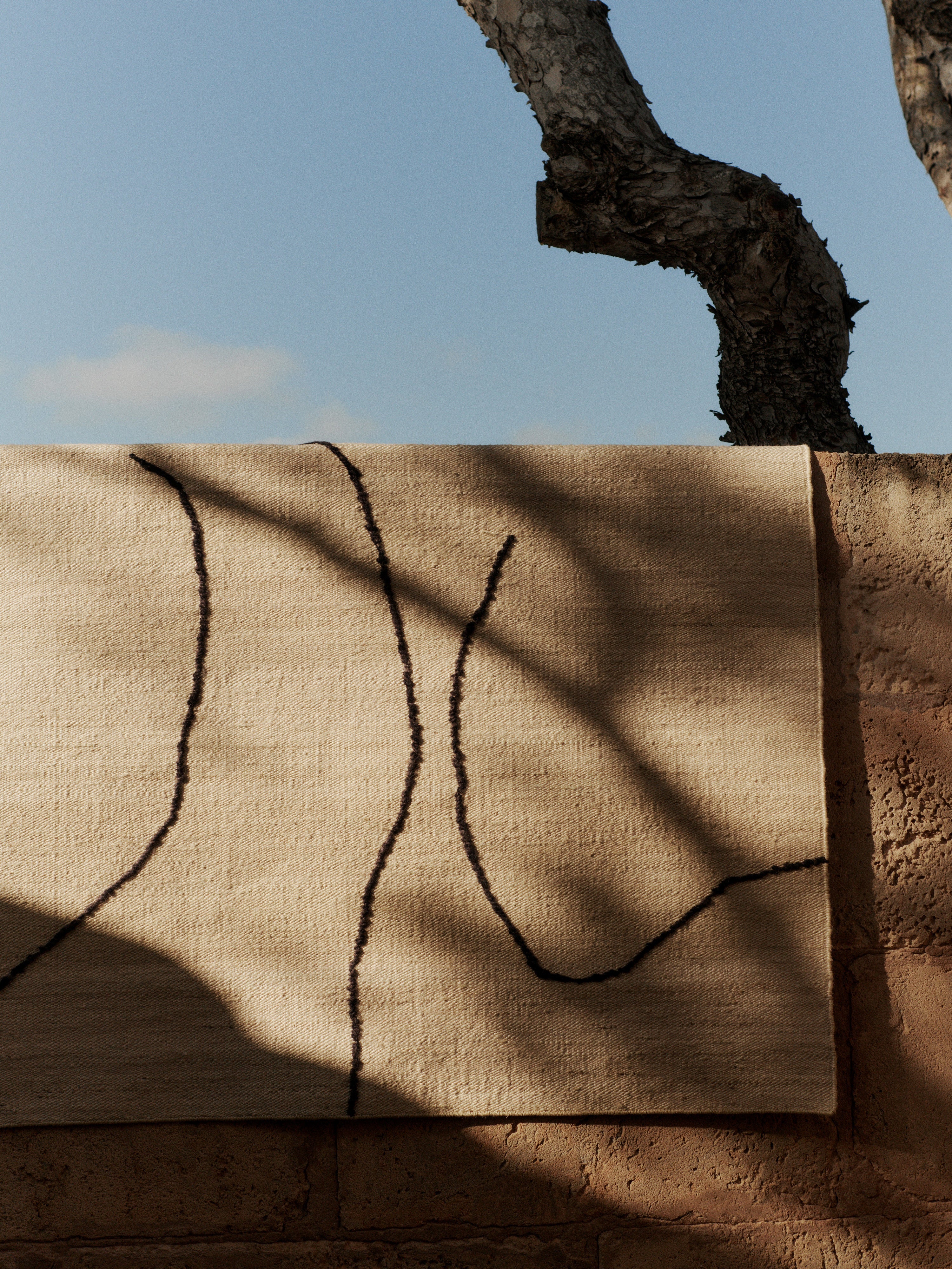 Dywan GESSO złamana biel z ciemną figą