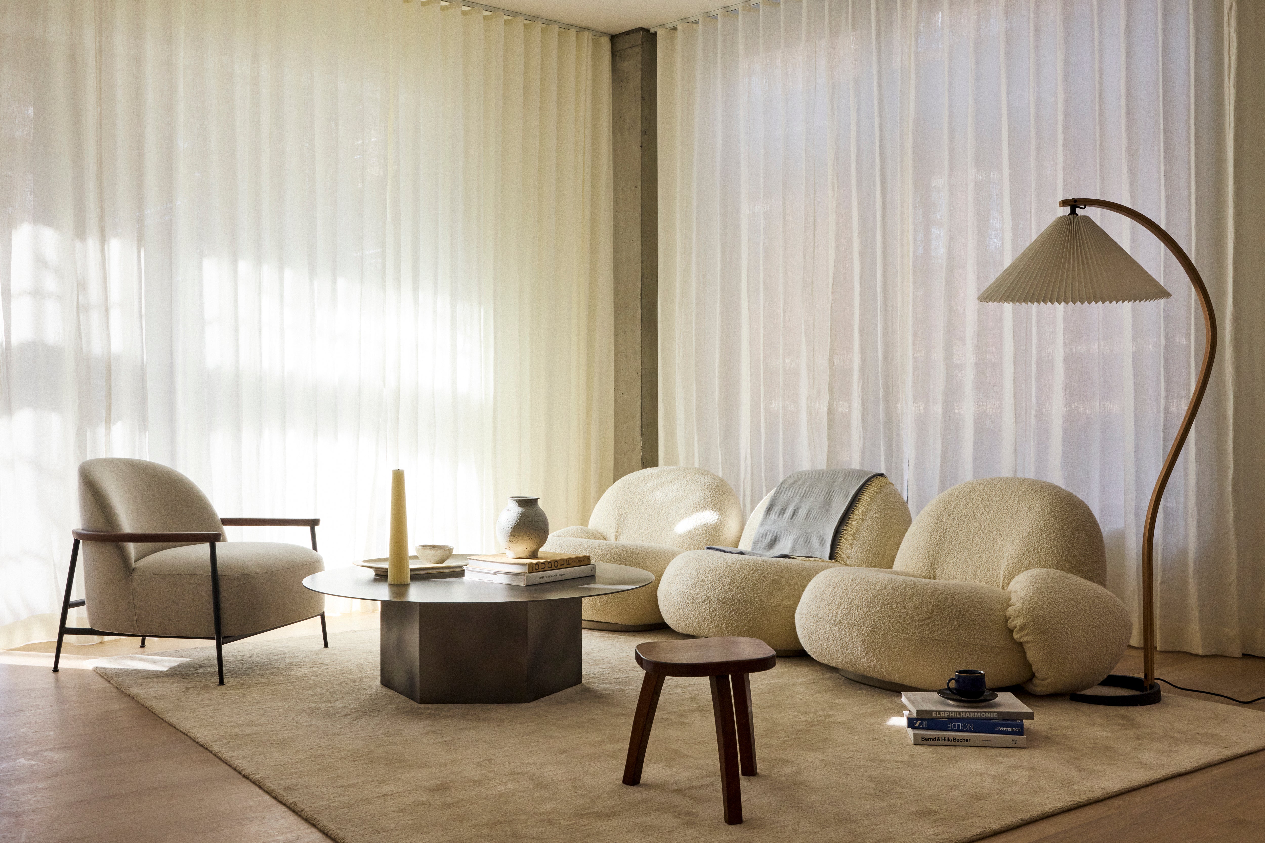 GUBI rug in rusty red with long pile