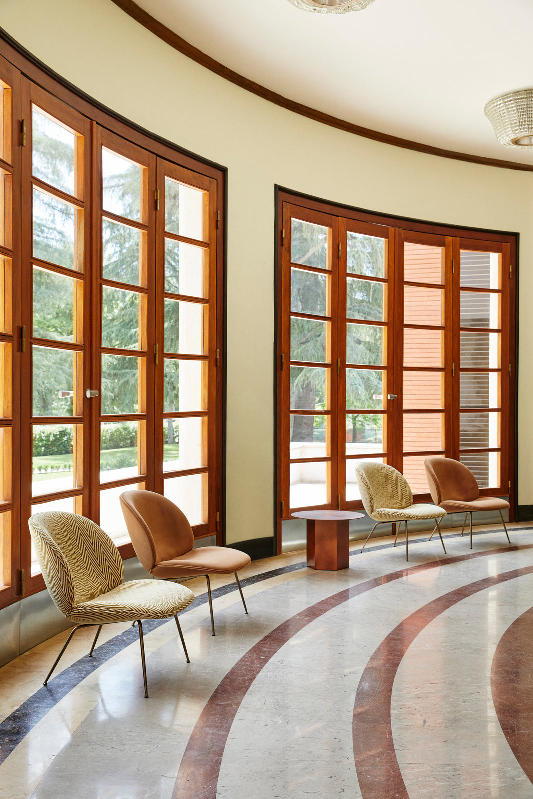 BEETLE upholstered armchair with black base