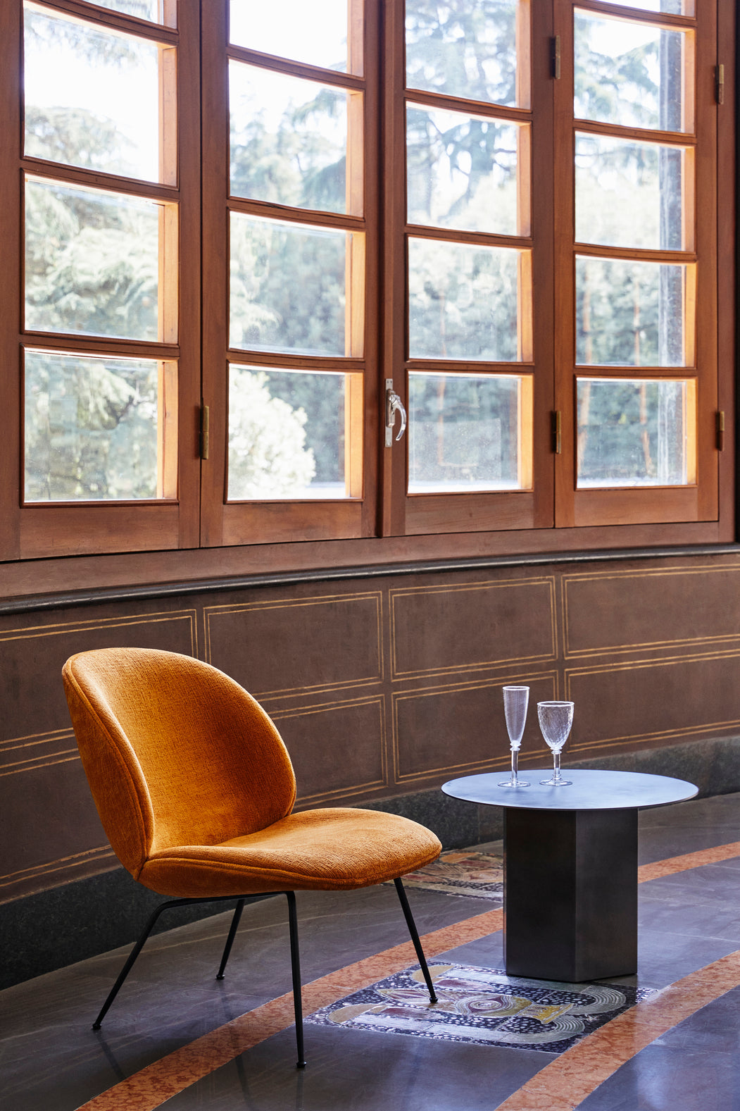 BEETLE upholstered armchair with black base