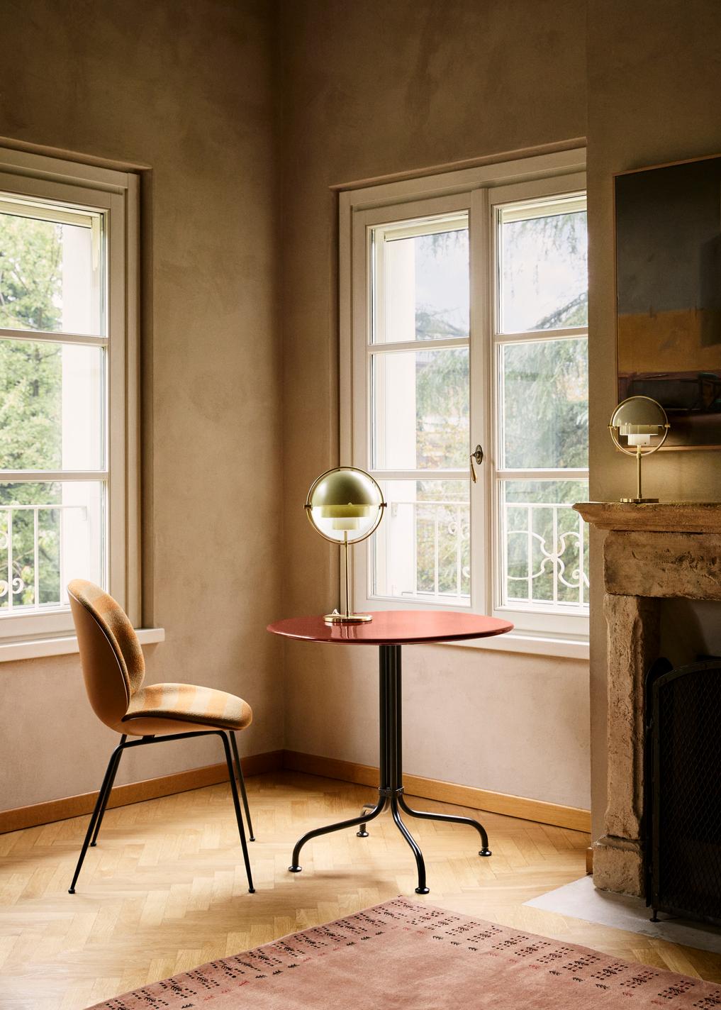 BEETLE upholstered chair with brass base