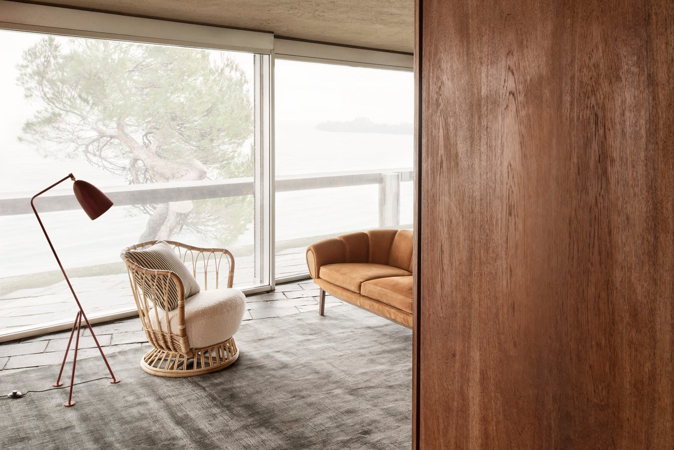 GUBI rug in rusty red with long pile