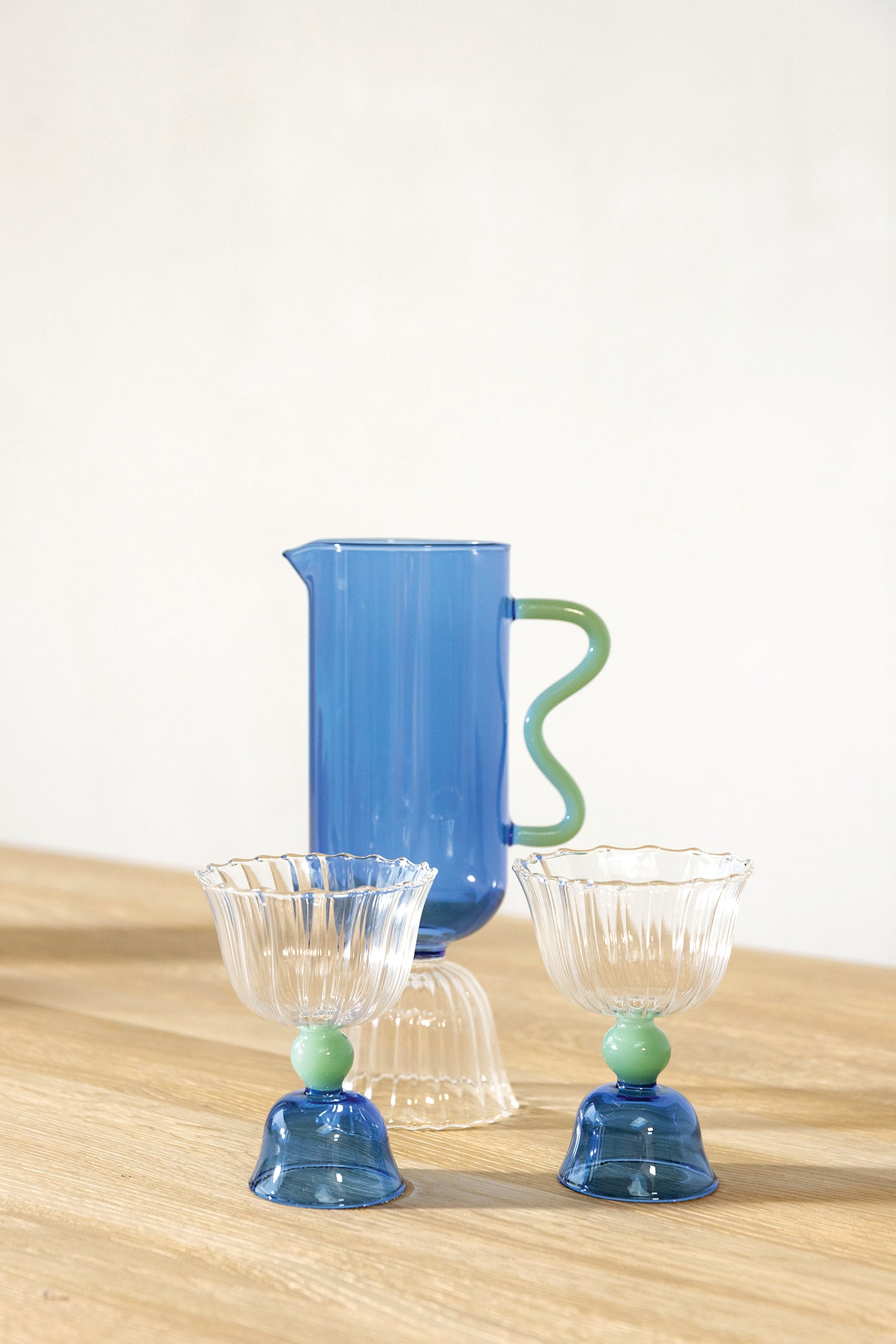 Set of glass tulip-shaped goblets blue with green