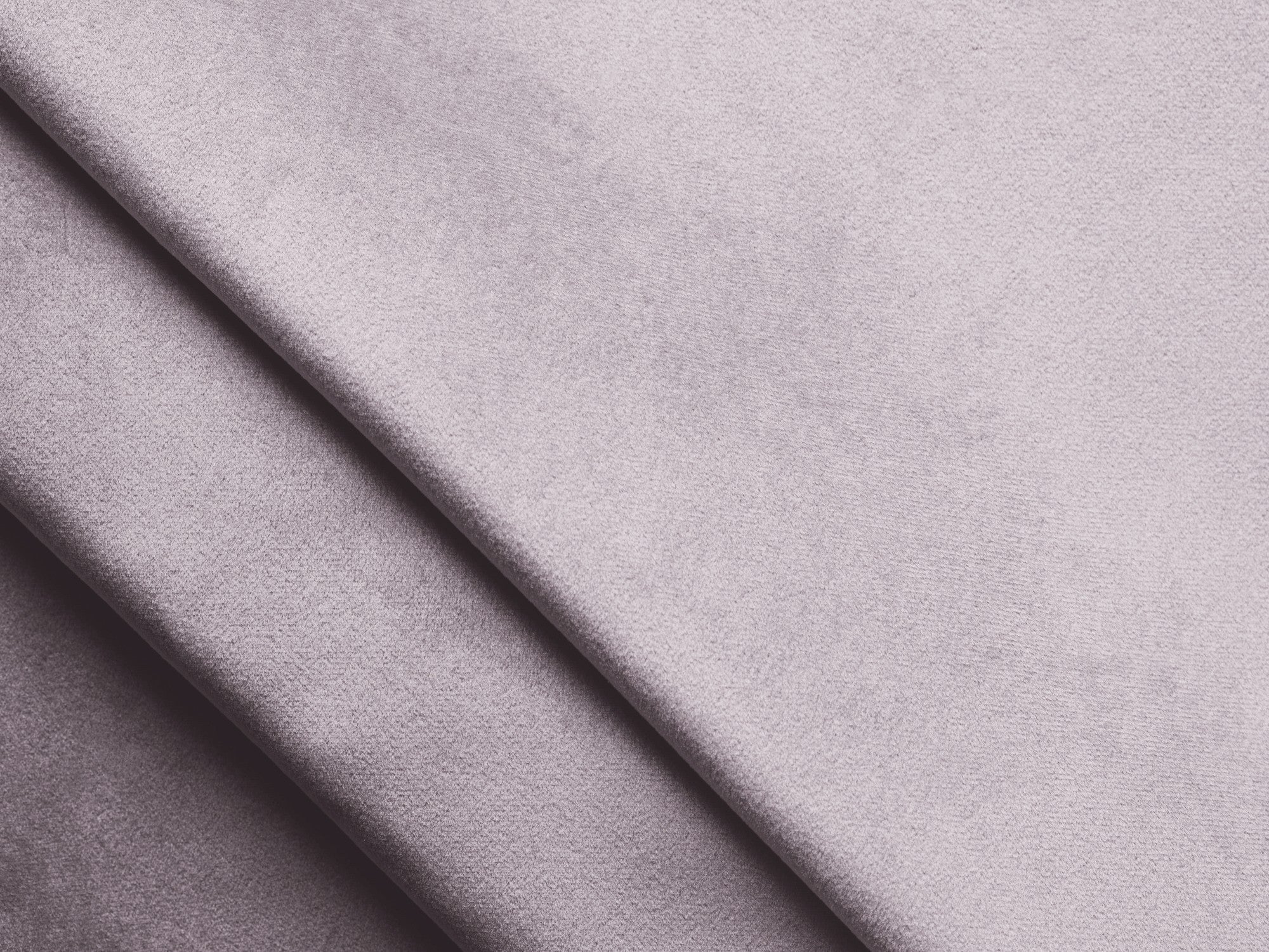 Rohová pohovka z jemného sametu pravostranná s funkciou spania KONA levanduľová