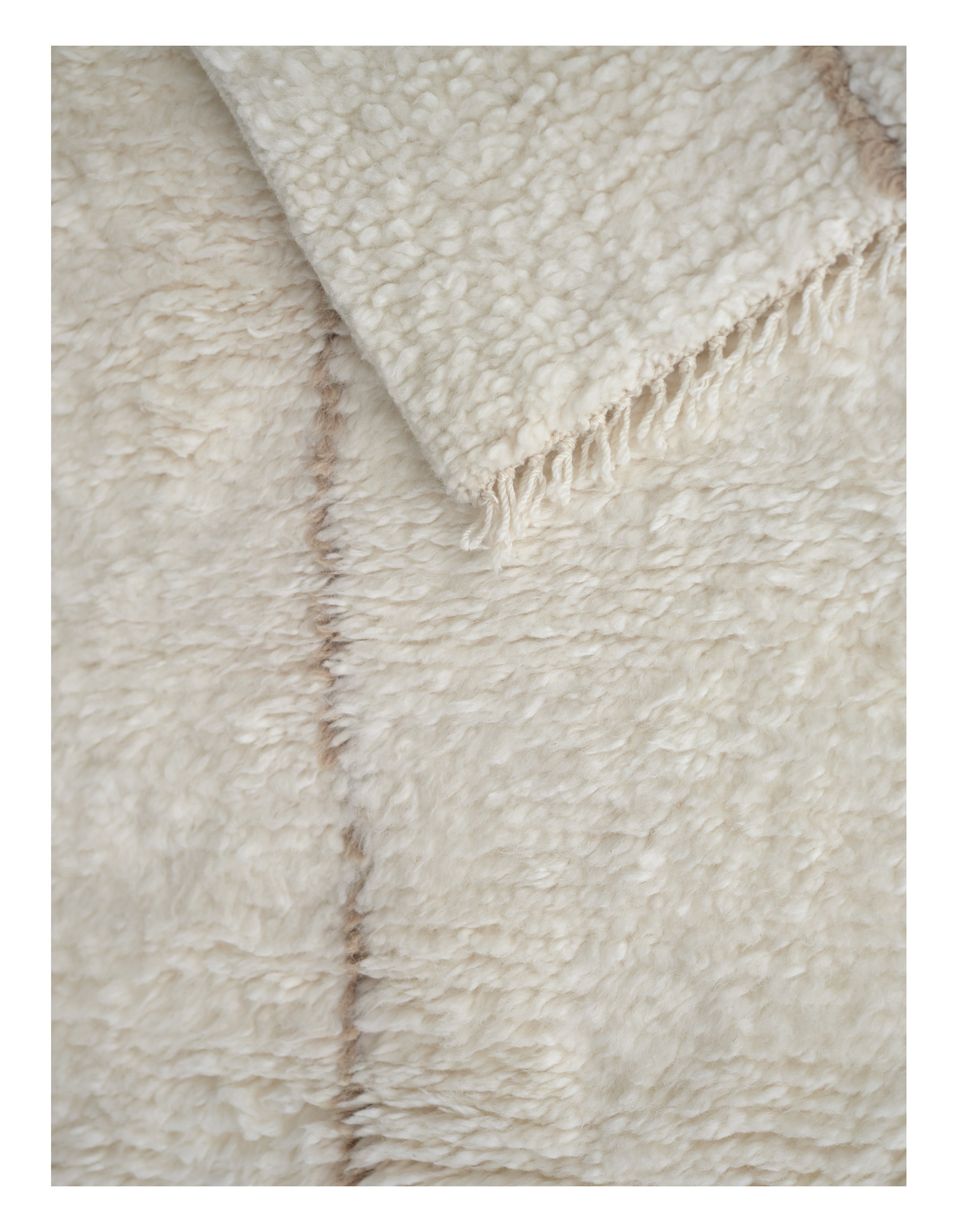 ASTRAL SPIRAL rug broken white with caramel pattern