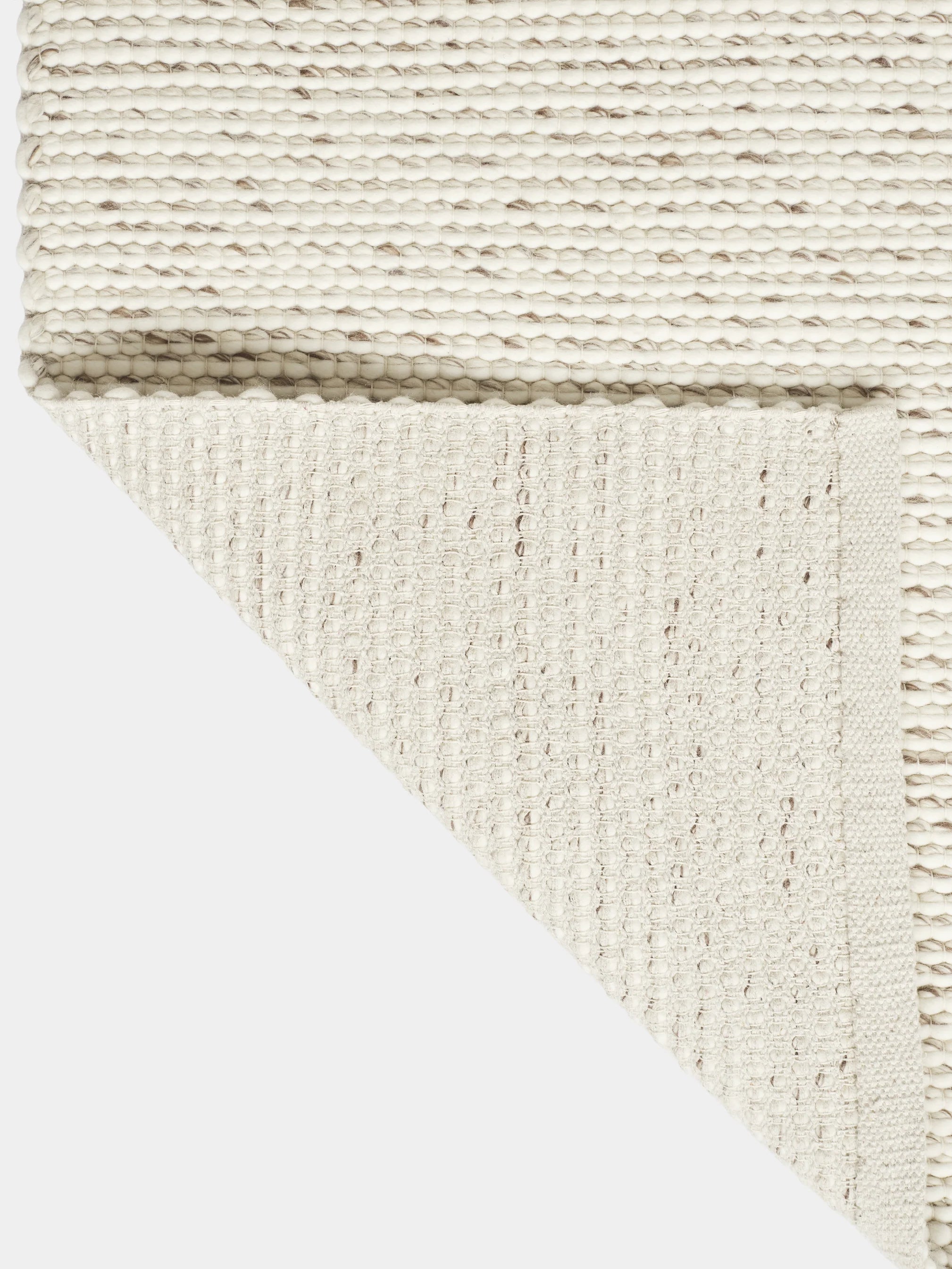 LOOPY cream rug with brown