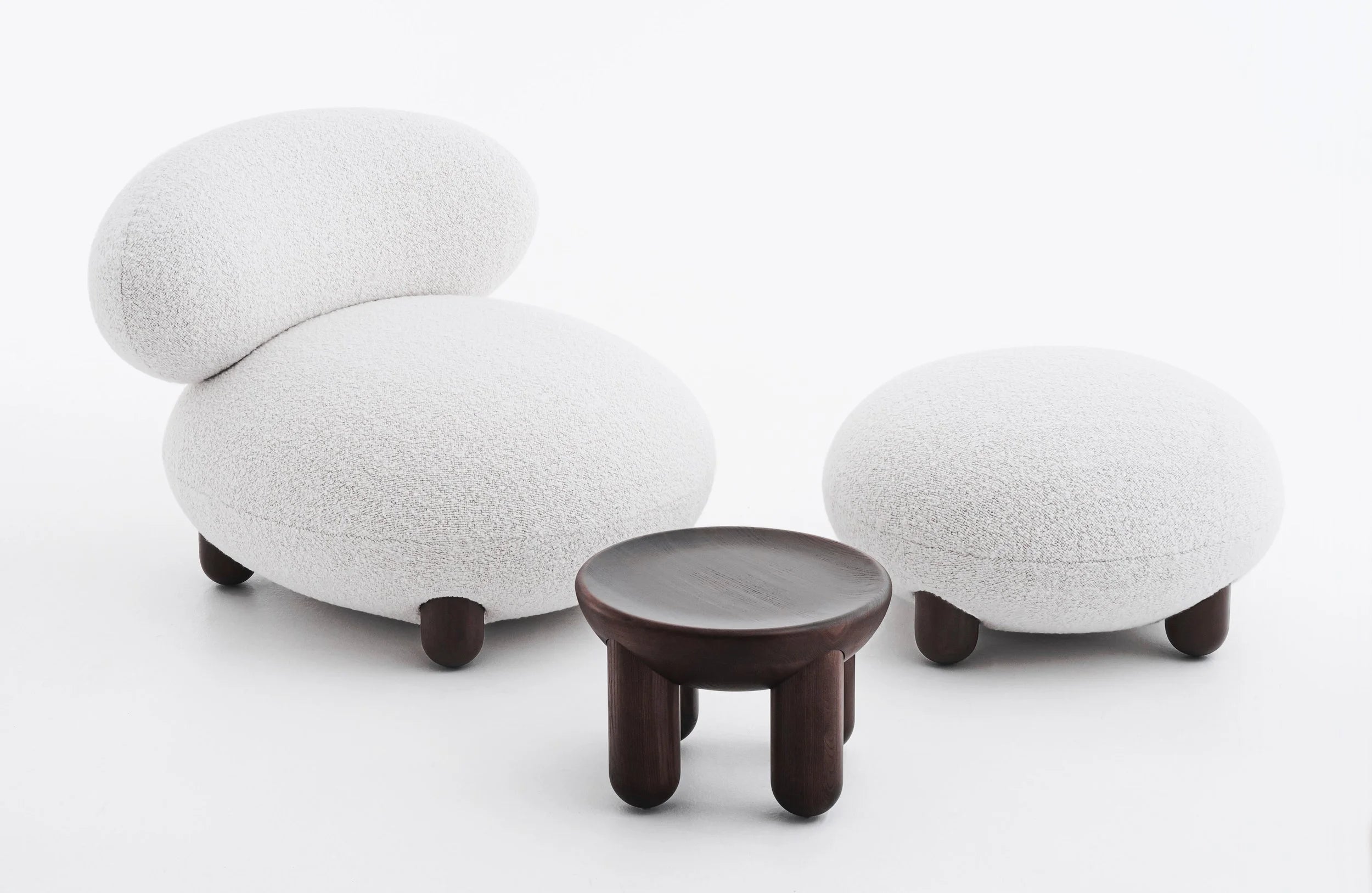 Upholstered pouf with wooden base
