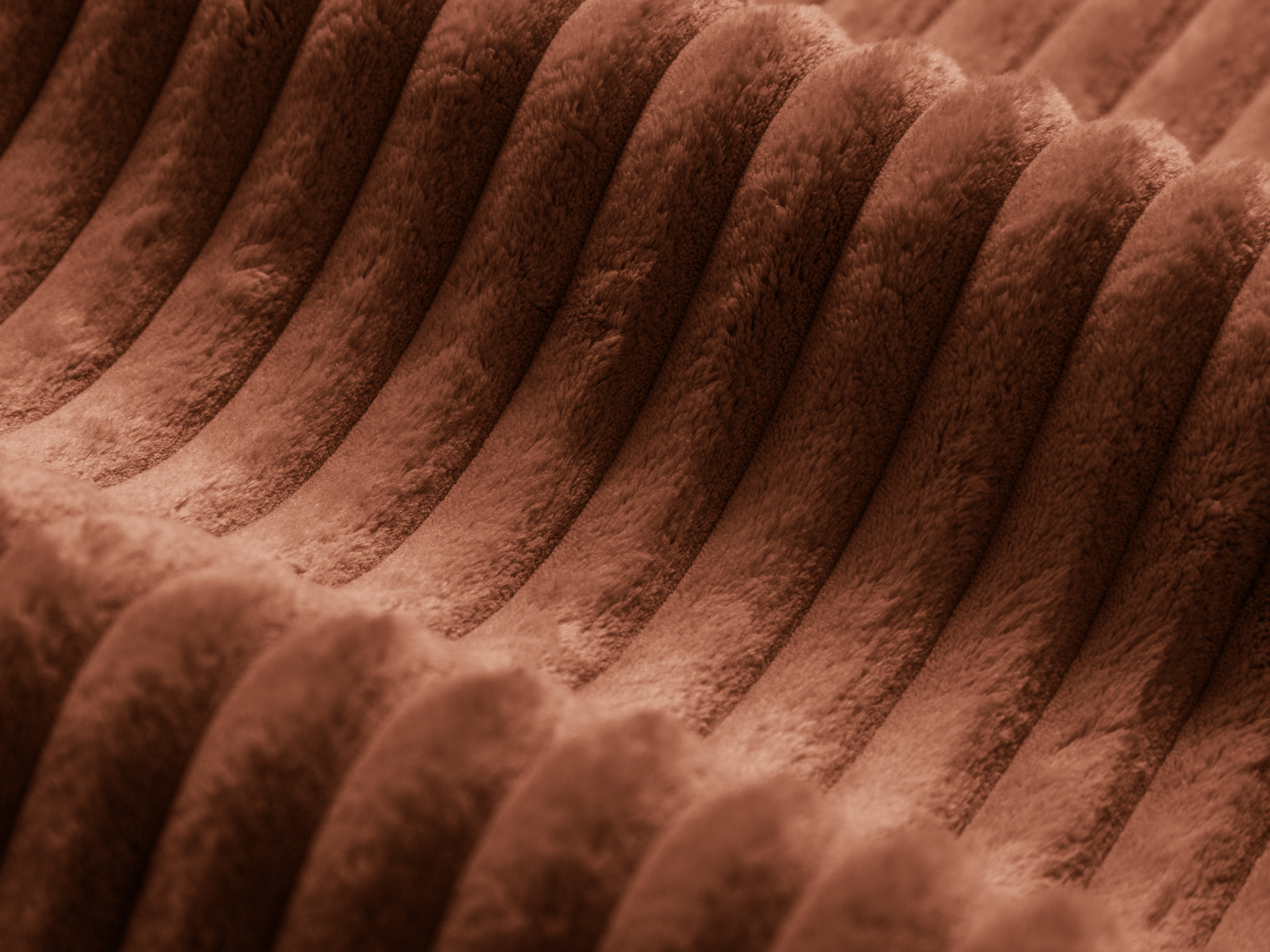 Left-hand corner of 2-person Martin brick corduroy