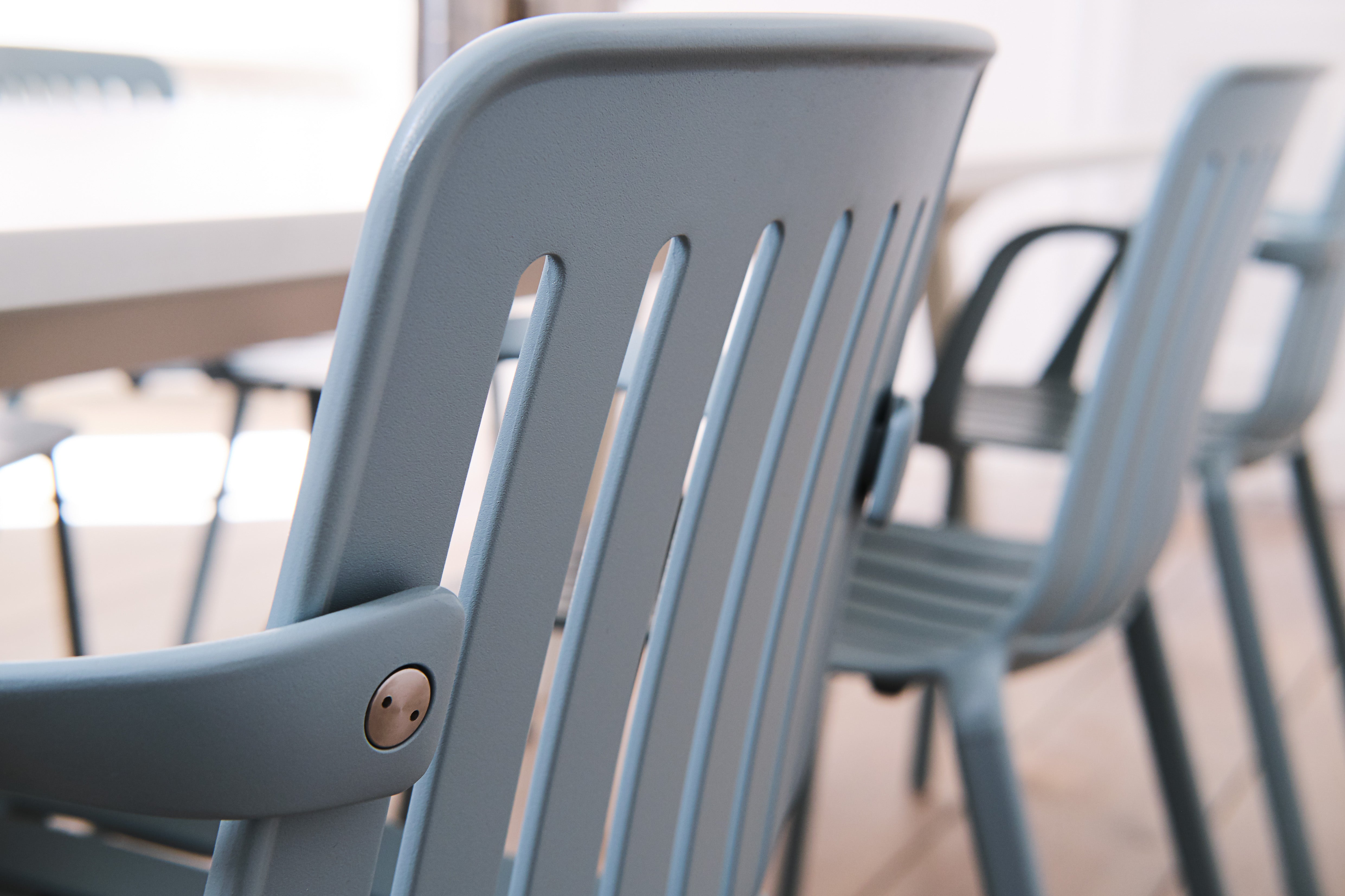 External chair with Plato Green armrests