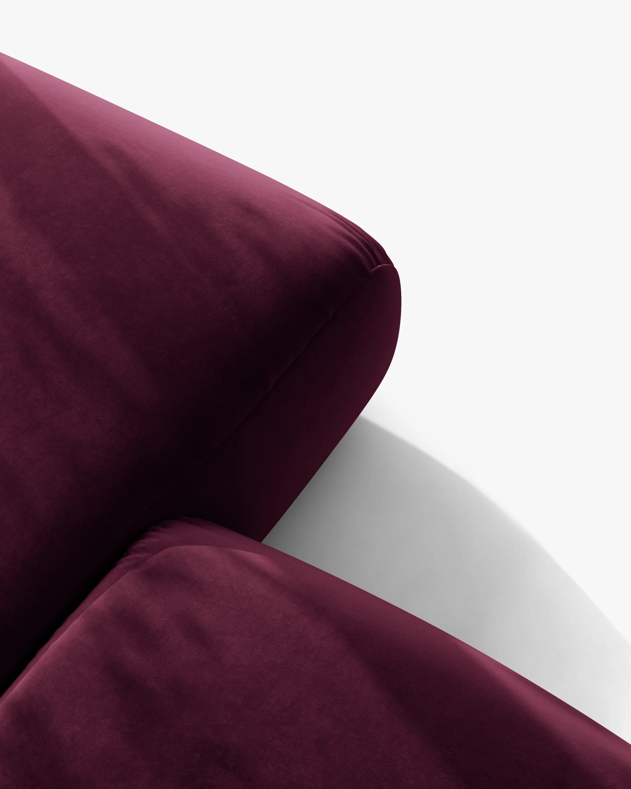 Panoramatický rohový sametový gauč OPHELIA v burgundskej farbe, ľavý.