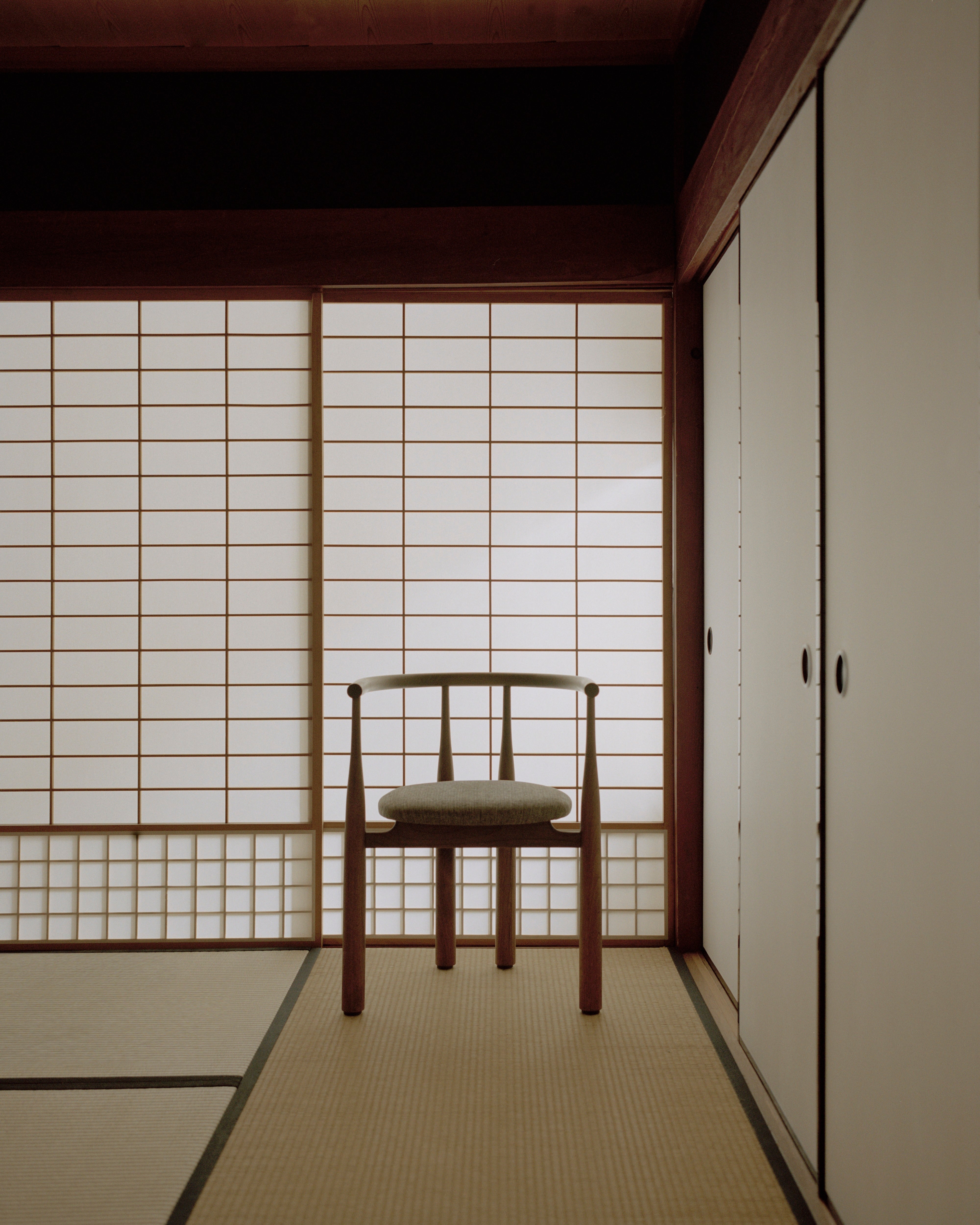 Bukowski chair upholstered with a nut base