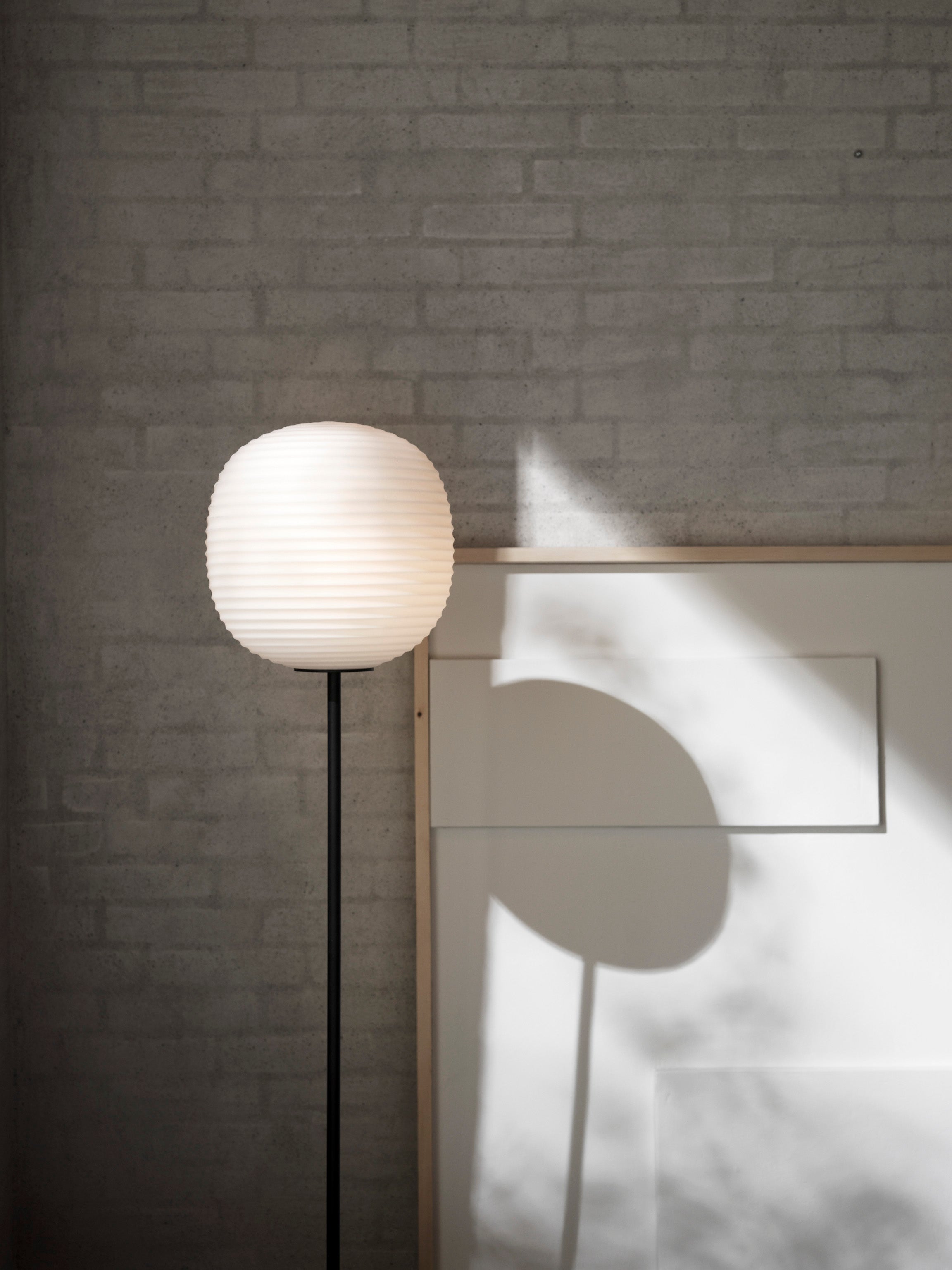 Lantern white floor lamp with a black base