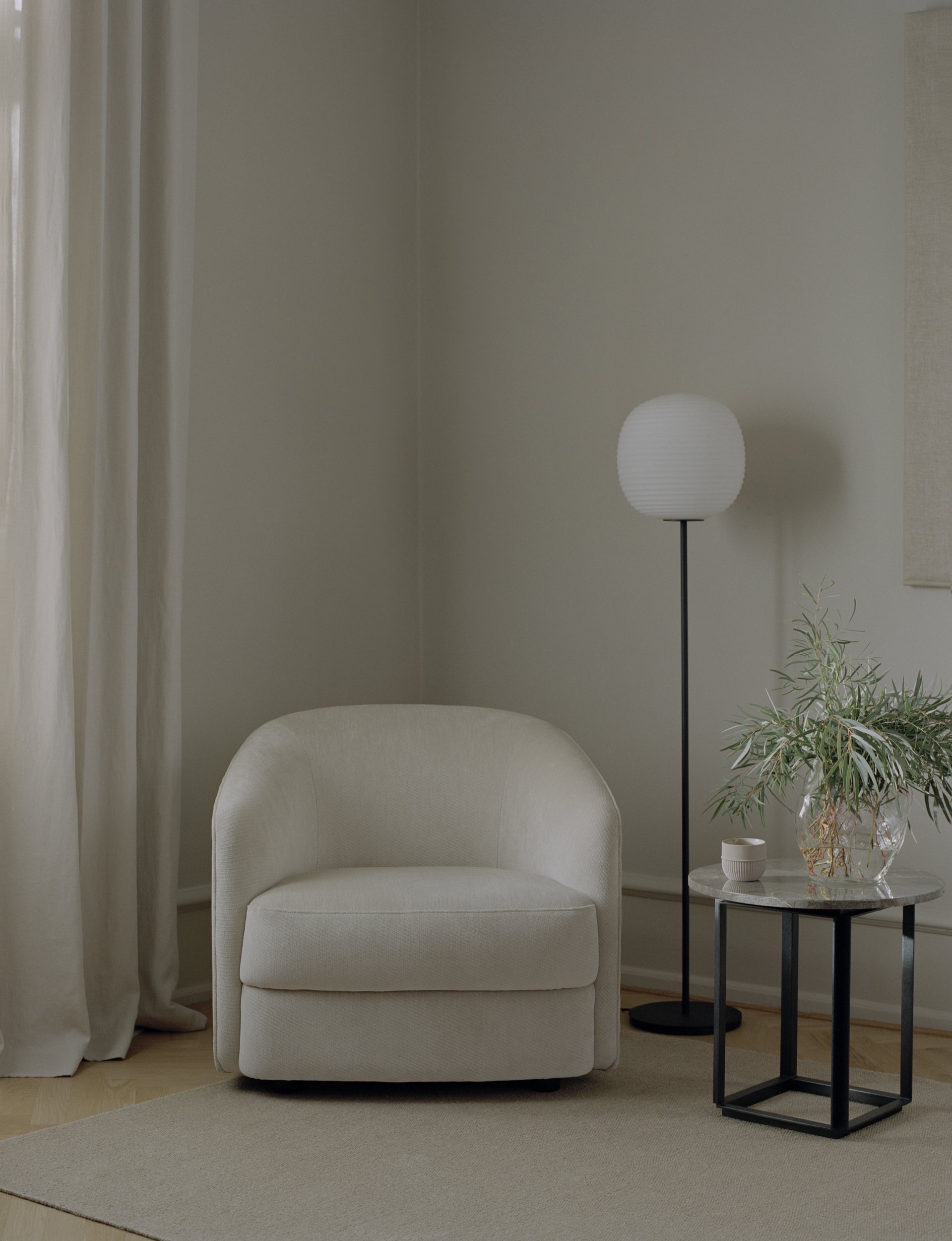 Lantern white floor lamp with a black base