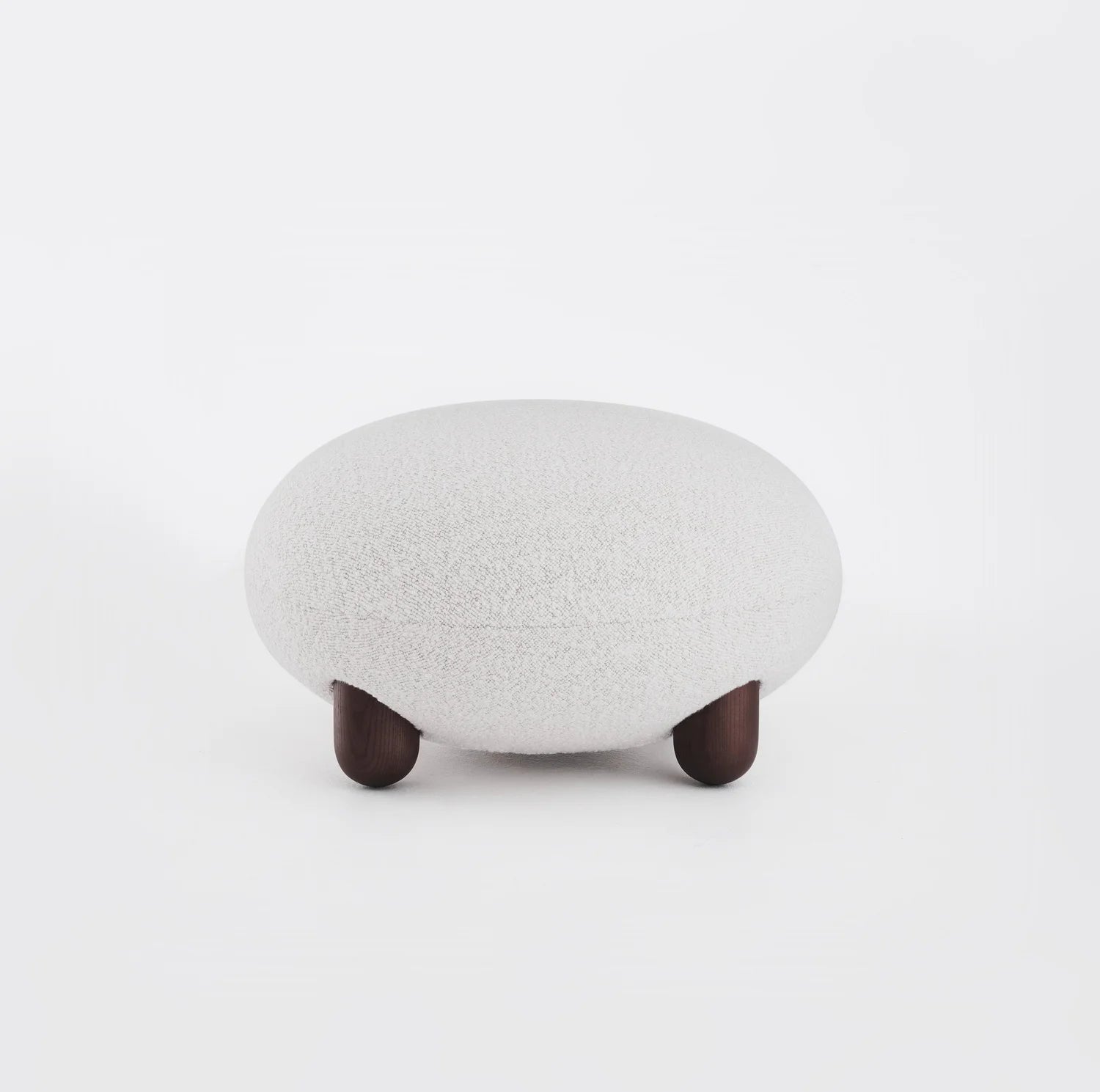 Upholstered pouf with wooden base