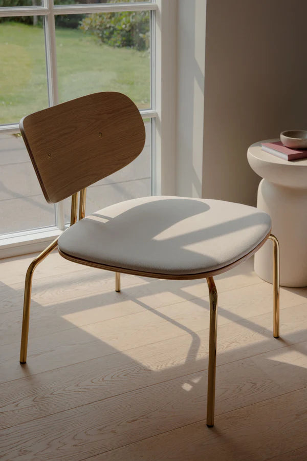 Curious oak veneer armchair with a golden base