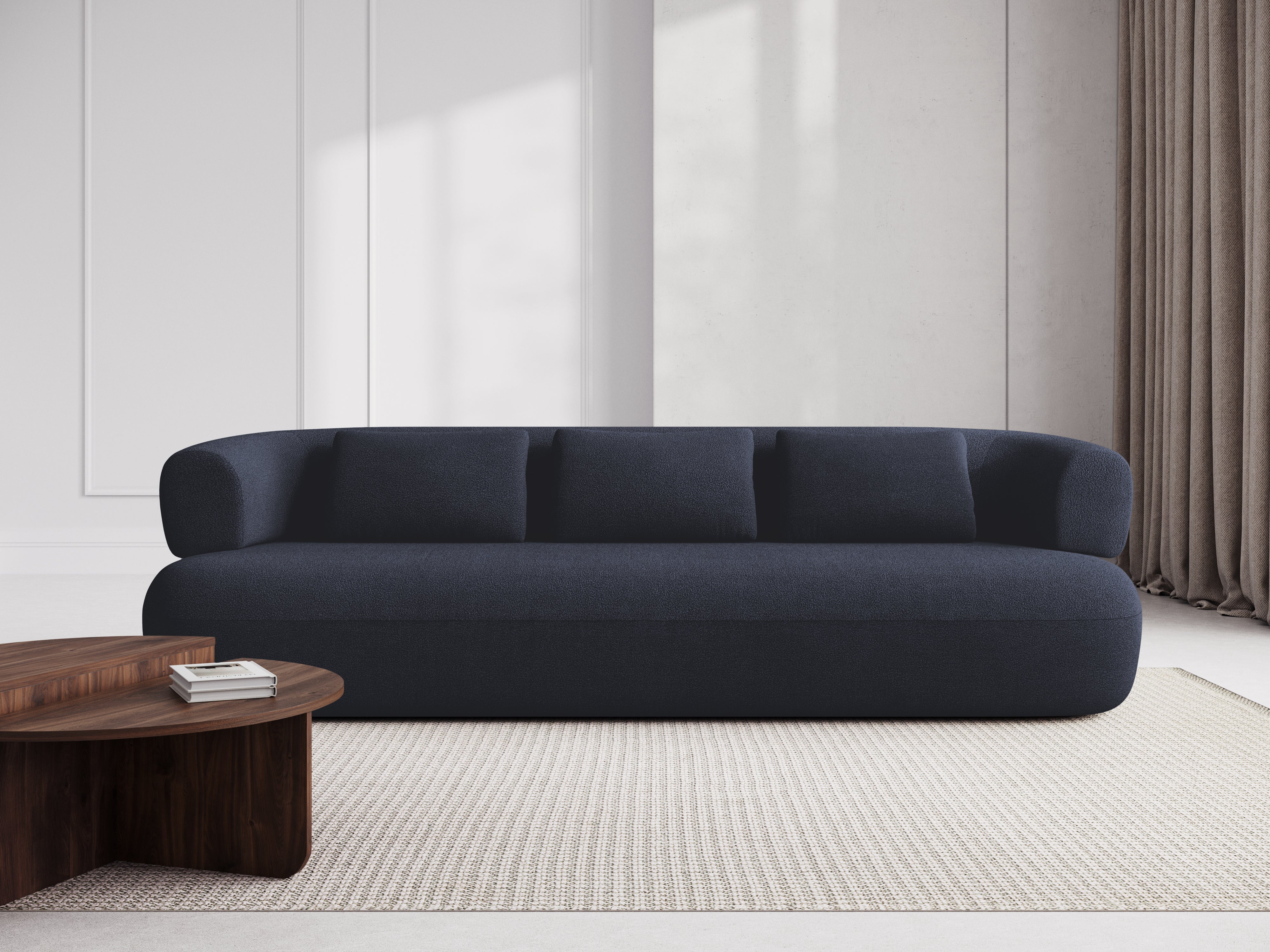 Sofa pre 3,5 osoby ALDRIN v granátovom boucle.