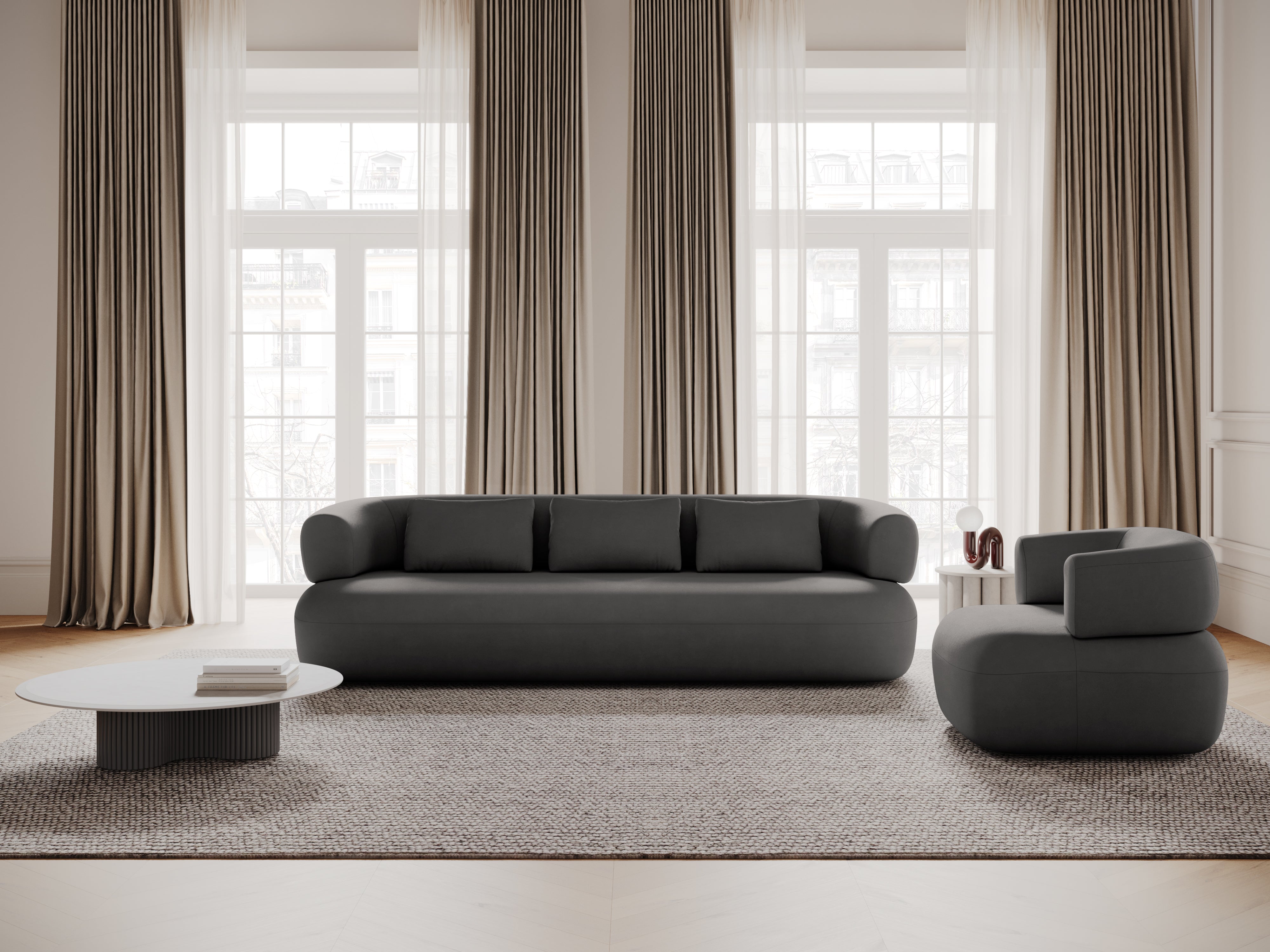Sofa z jemného aksamitného materiálu pre 4 osoby ALDRIN v tmavosivej farbe.