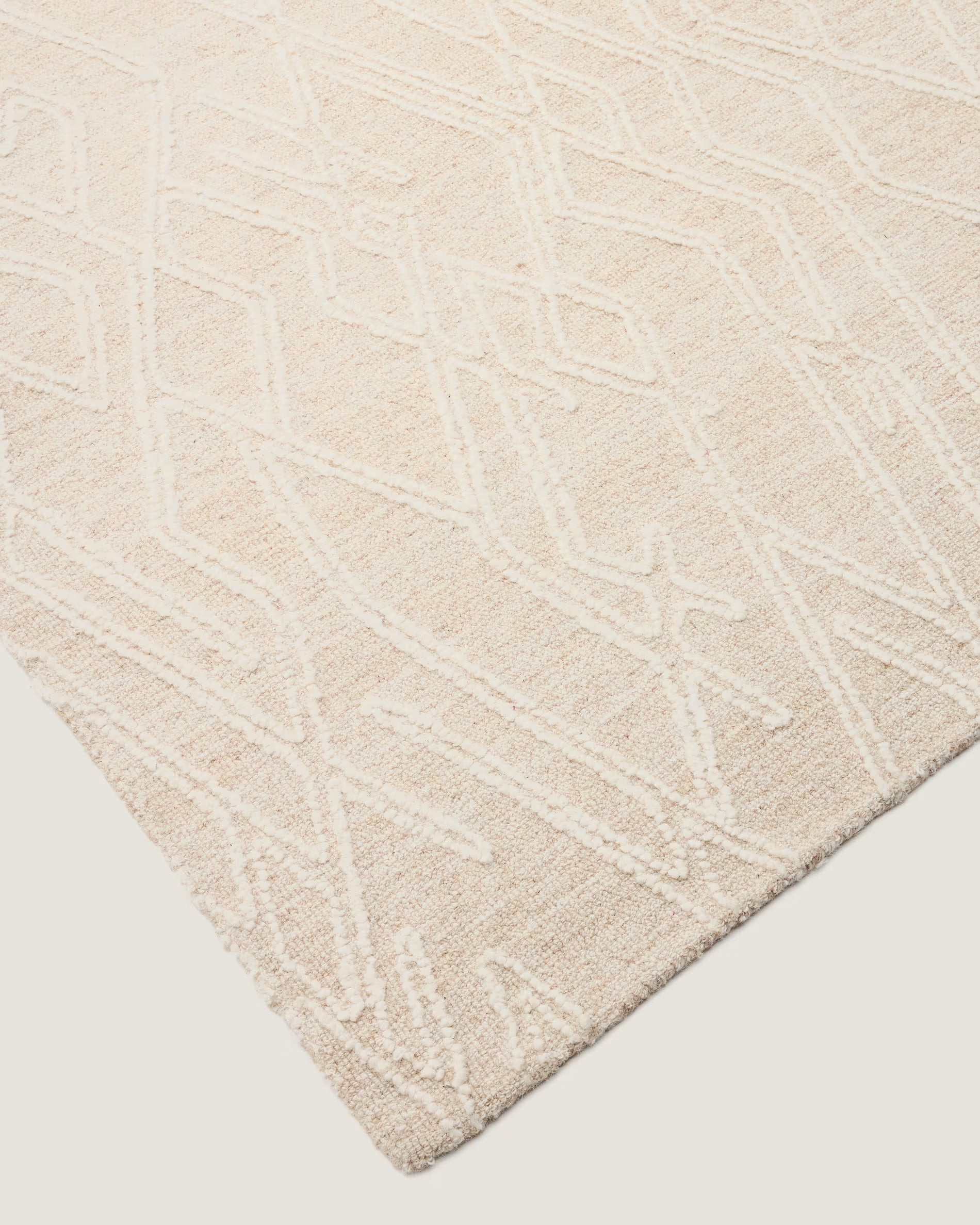 SELIRA Beige Carpet with Embroidery Effect
