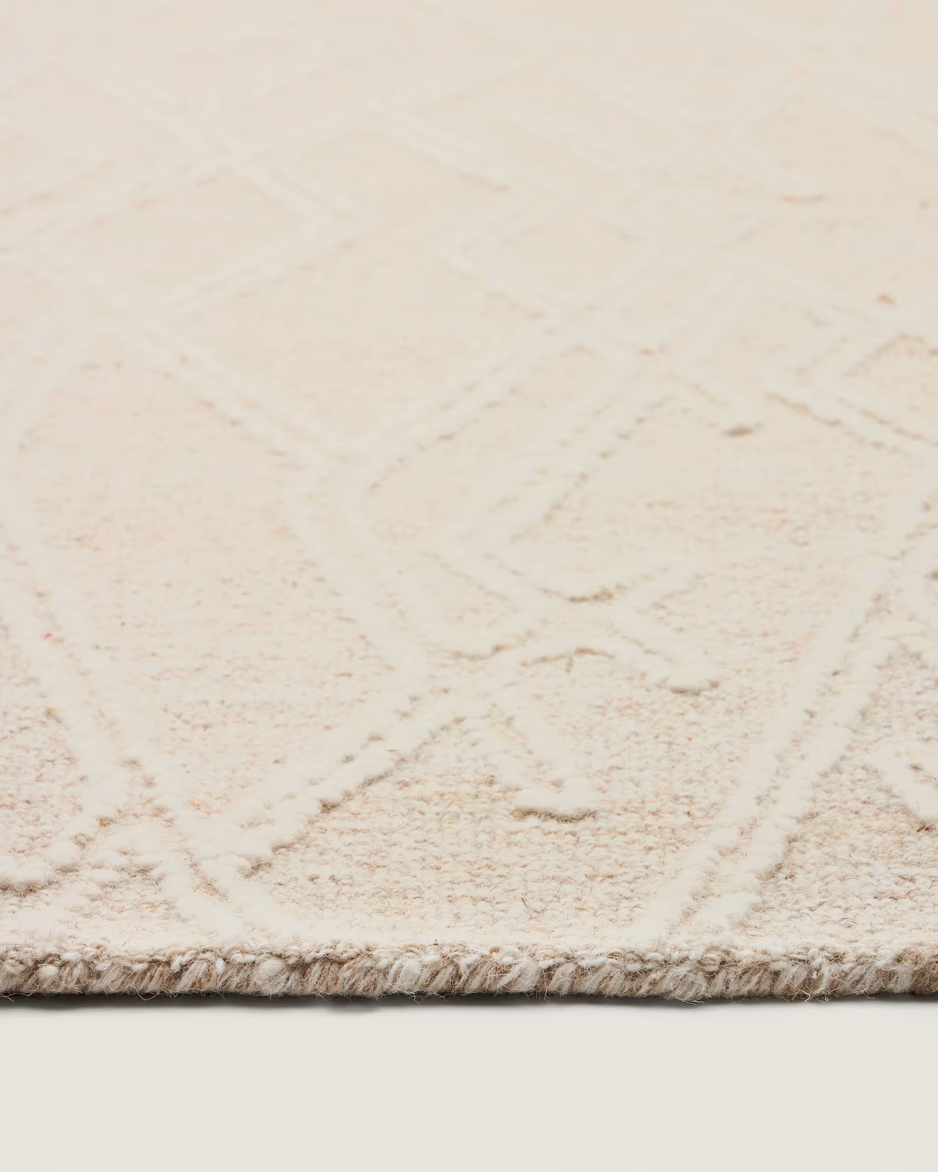 SELIRA Beige Carpet with Embroidery Effect