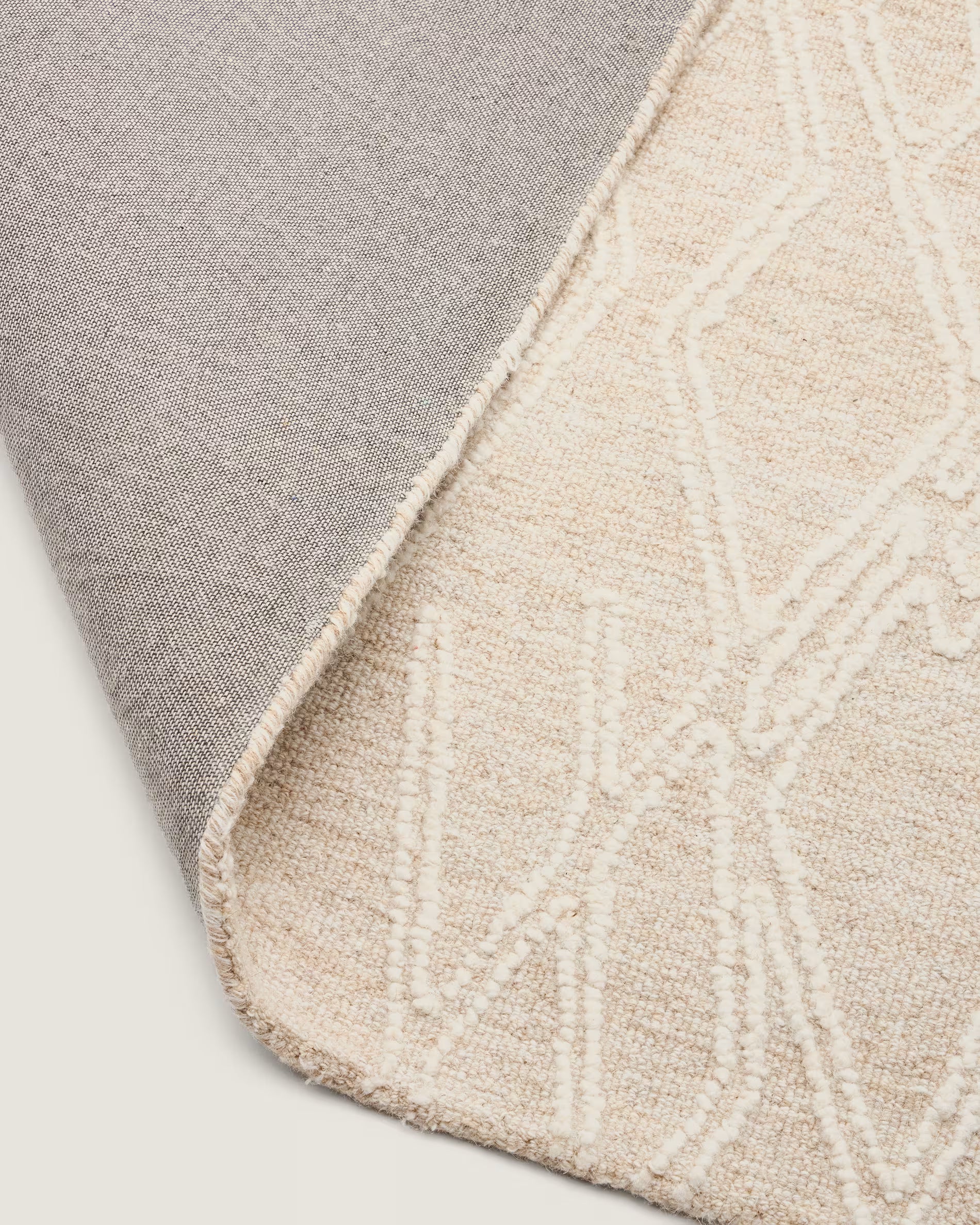 SELIRA Beige Carpet with Embroidery Effect