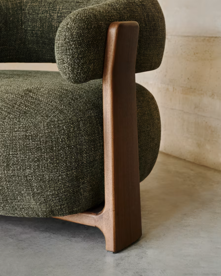 GRANITE green armchair with a dark ash base