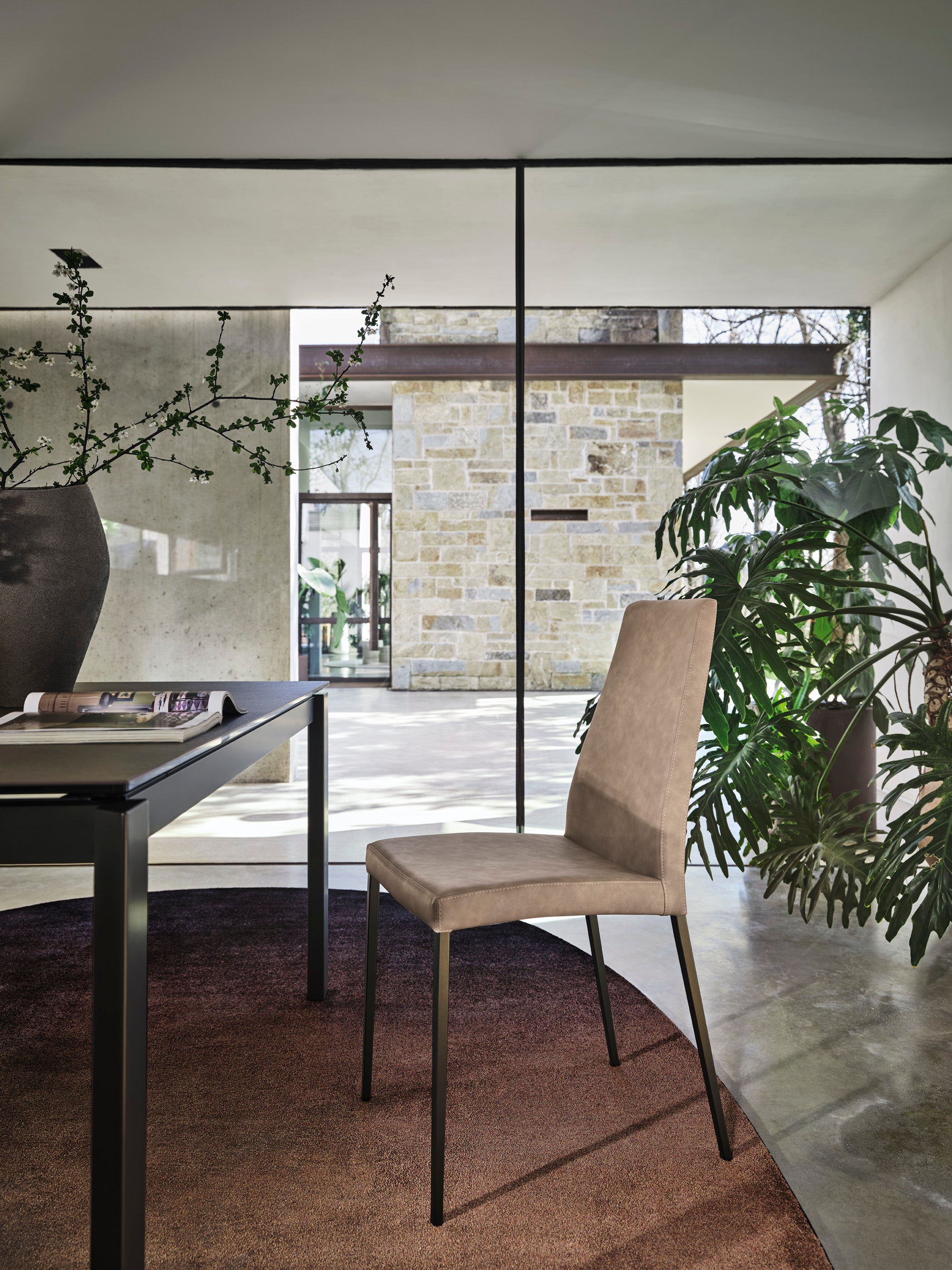 AIDA upholstered chair with a gray base