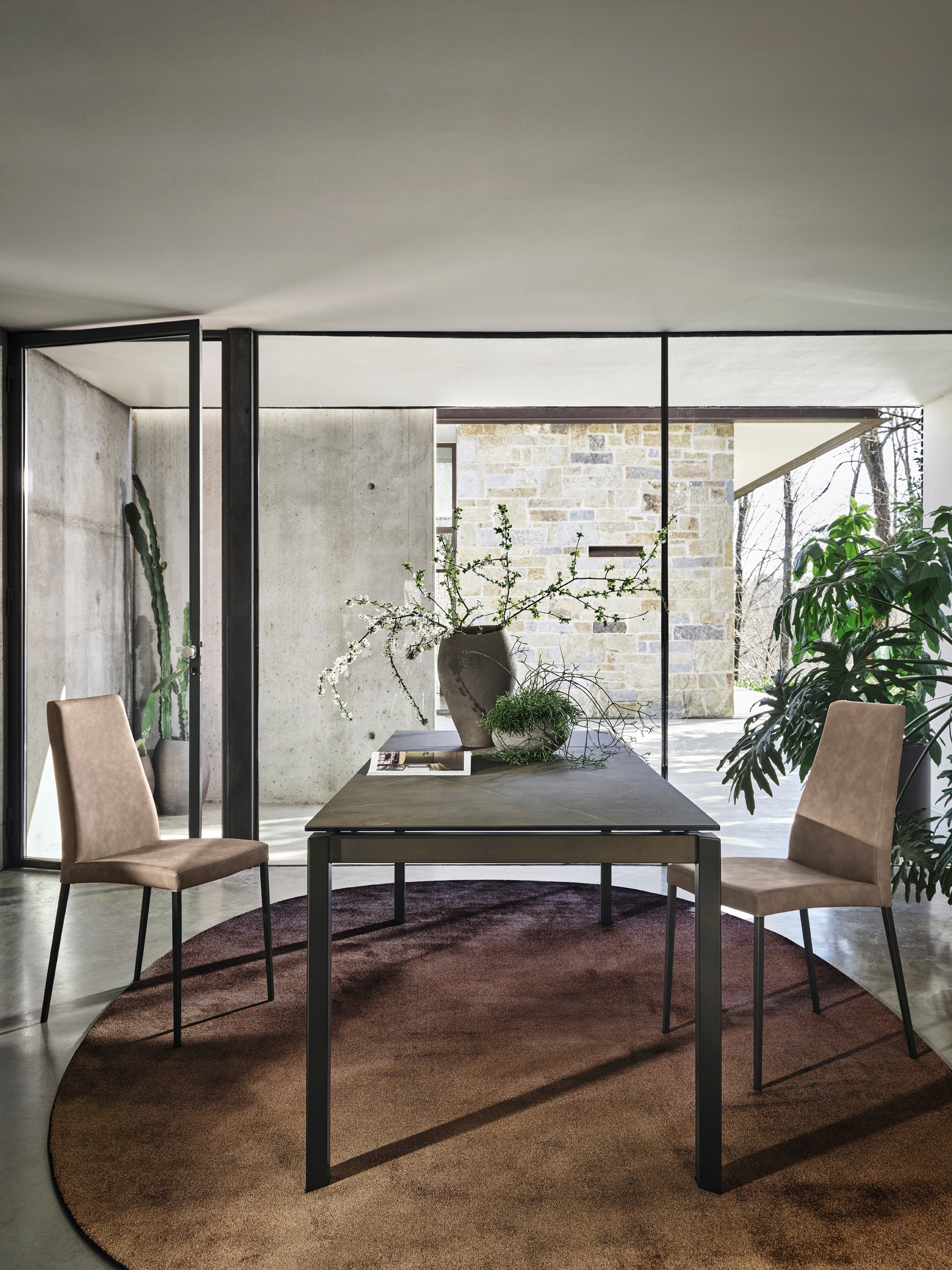 AIDA upholstered chair with a gray base