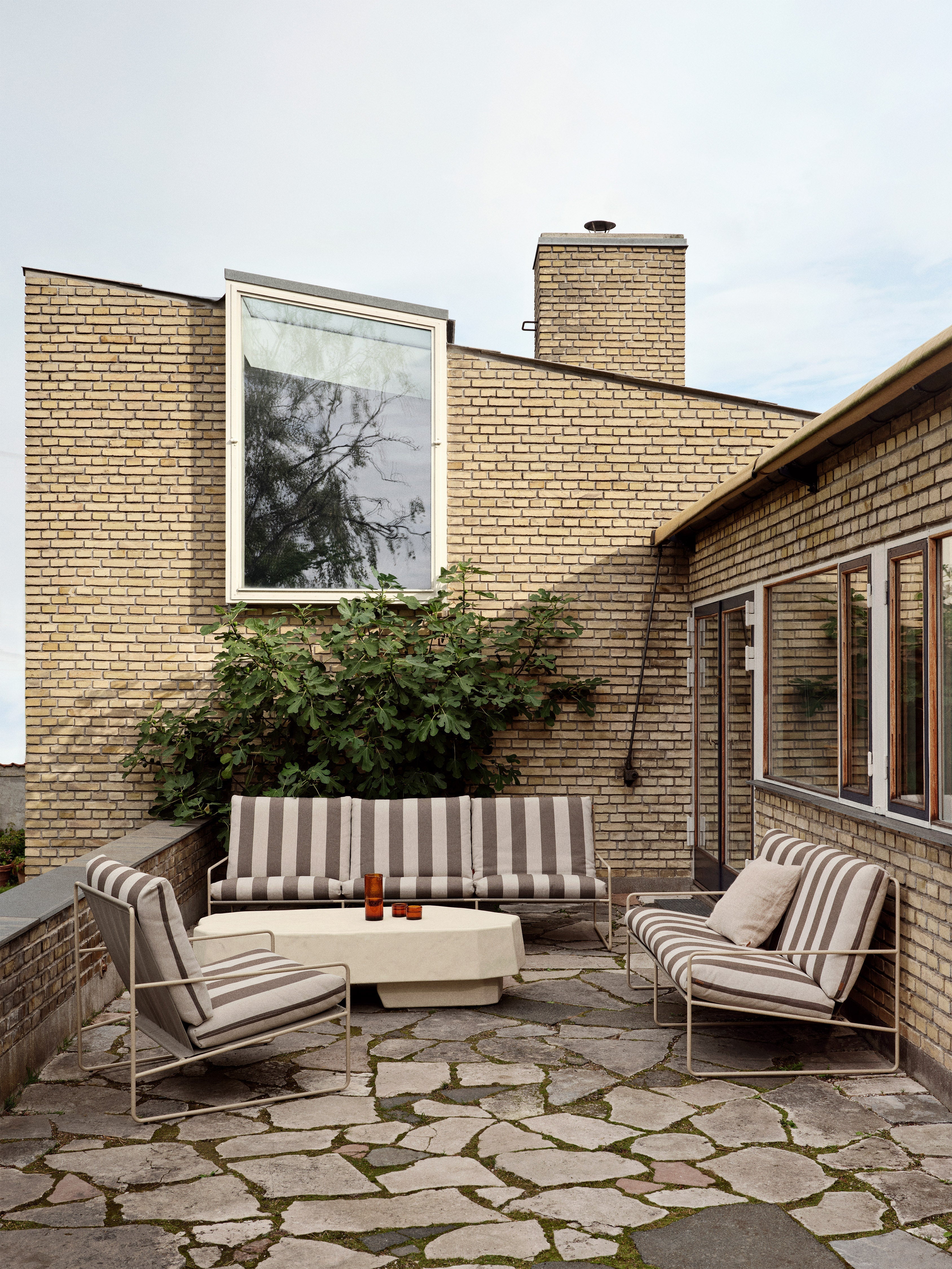 2-person sofa desert cream-brown with a beige base