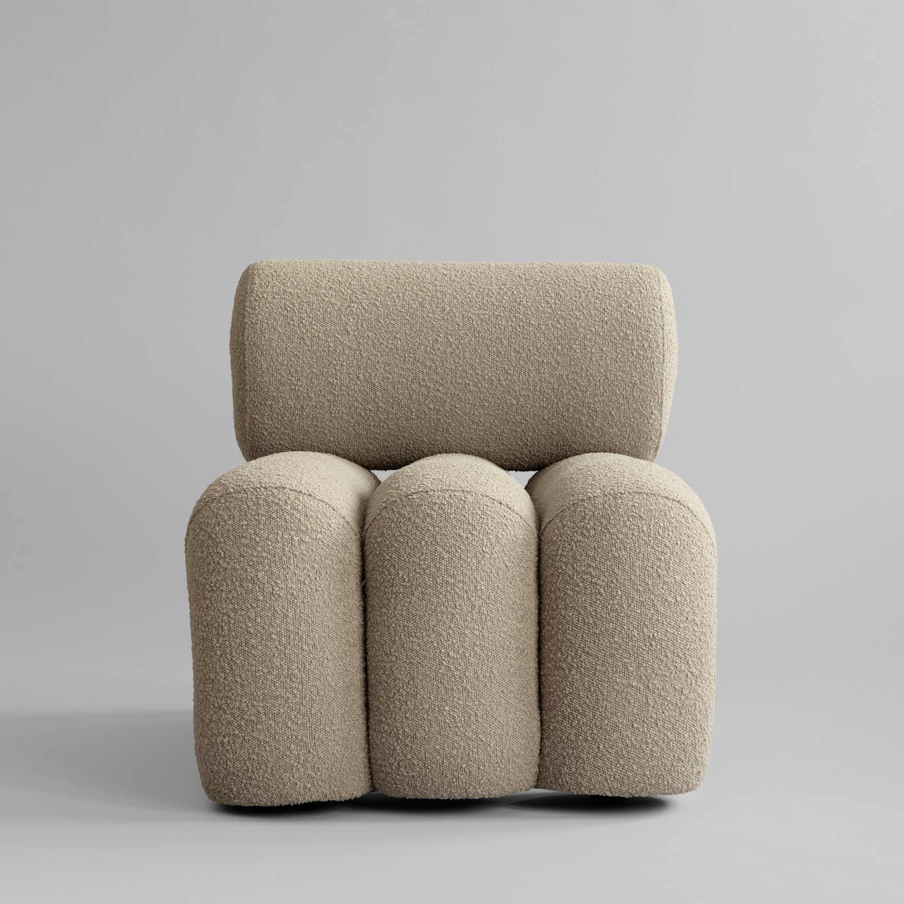 FOKU armchair in sandy boucle