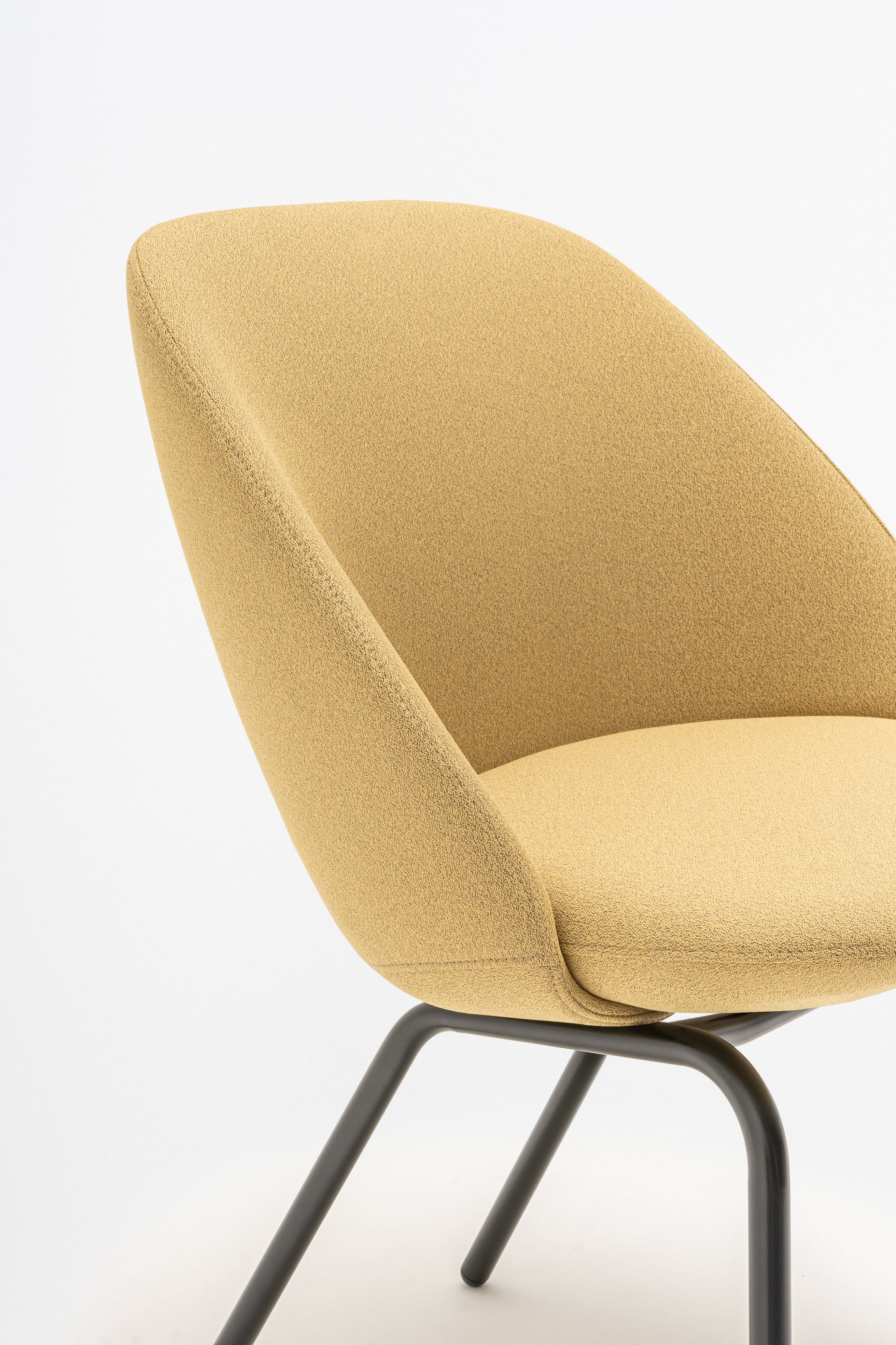 Armchair with low backrest parallel four -legged base