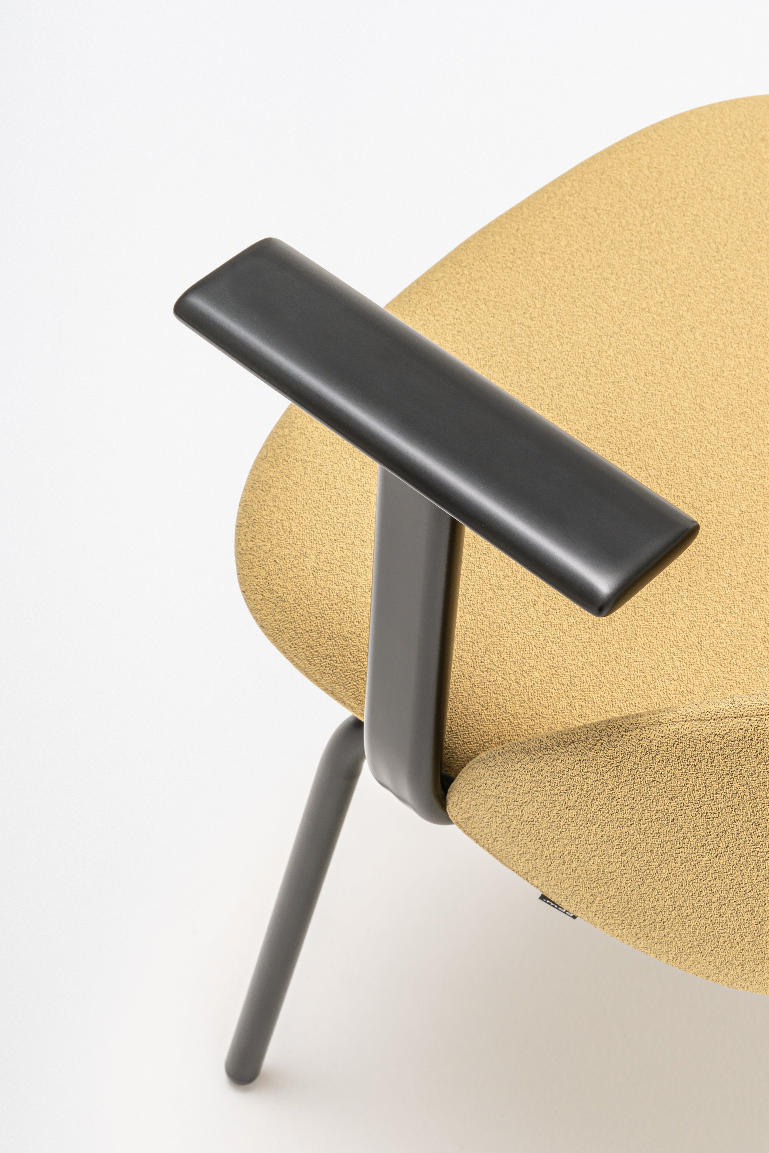 Armchair with low backrest parallel four -legged base