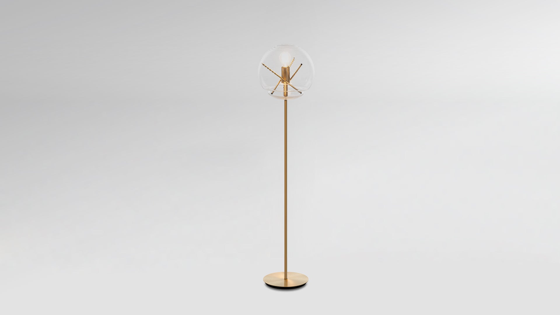 VITRUVIO floor lamp transparent with a gold base