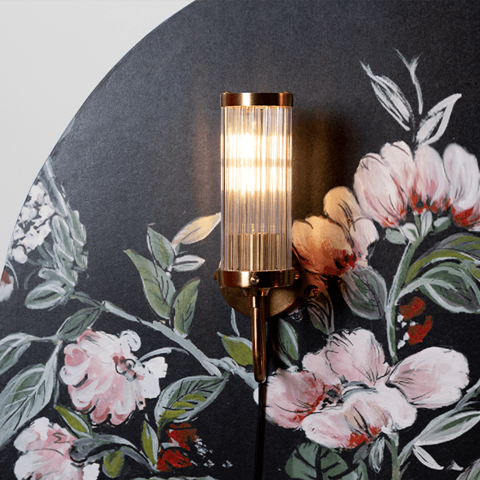 Modern acrylic design tubes are complemented by a matte brass wall finish. Thanks to our fashionable Angel On Fire wall lamp, you can softly and stylishly illuminate the wall in the gallery or add the glow of empty wall space. Style that