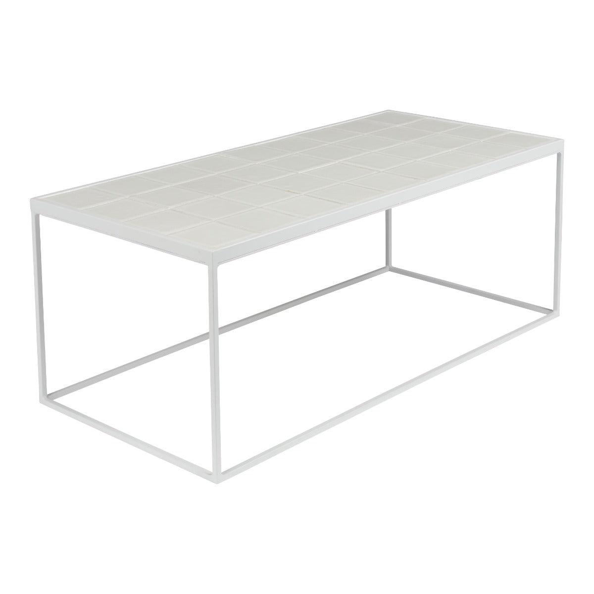 The Glazed table is an elegant form of furniture that adds style, grace and transparency. Lack of filling under the countertop does not overwhelm the room, while creating the impression of fullness. High -quality metal frame painted with a powder method with a top composed of tiles, it works great in a modern living room, especially in the holiday zone. He will perfectly complement the Scandinavian bedroom as a bedside table.