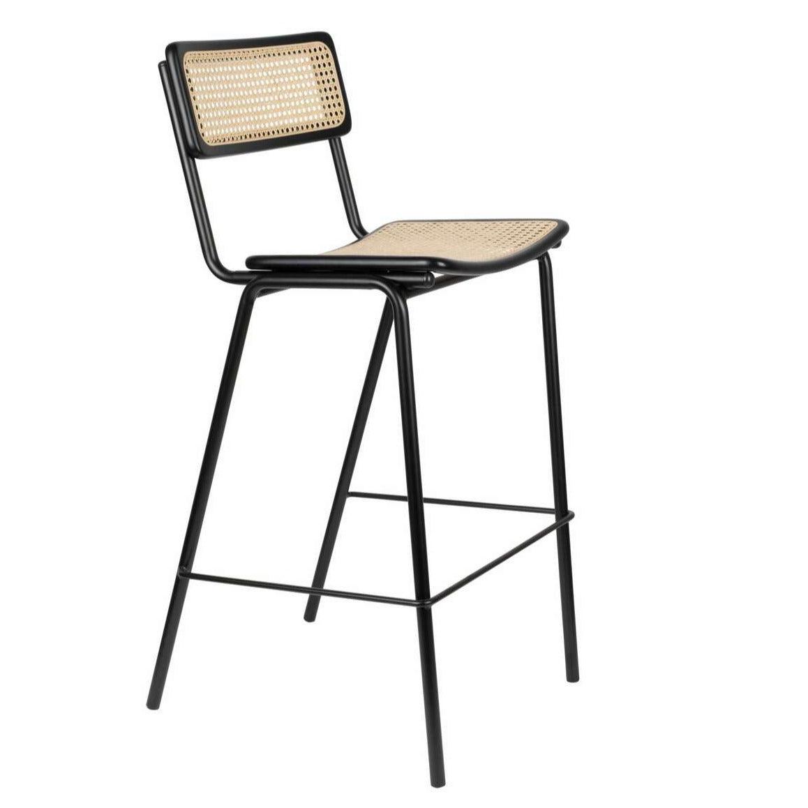 The combination of the appearance of the 21st century and the Bauhaus period is the definition of the JORT bar stool. The braided seat and backrest from rattan was locked in a steel frame, along with its wooden elements. Thanks to the use of such materials, each room in the boho atmosphere, and in particular the kitchen will gain even greater coziness. Each island will become a place to relax and drink afternoon coffee.