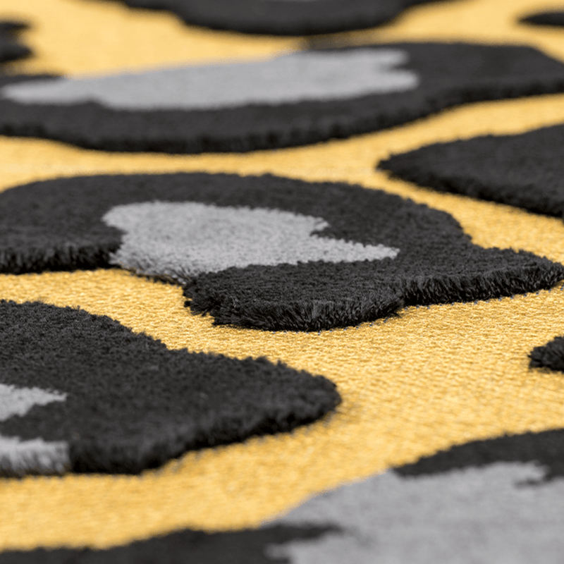 The bold monkey it's a wild world rug Mama Panther is a simple way to change the character of the room. It is a vocal point for minimalist interiors or a fun sparring partner for each room that is not afraid of a collision of prints.