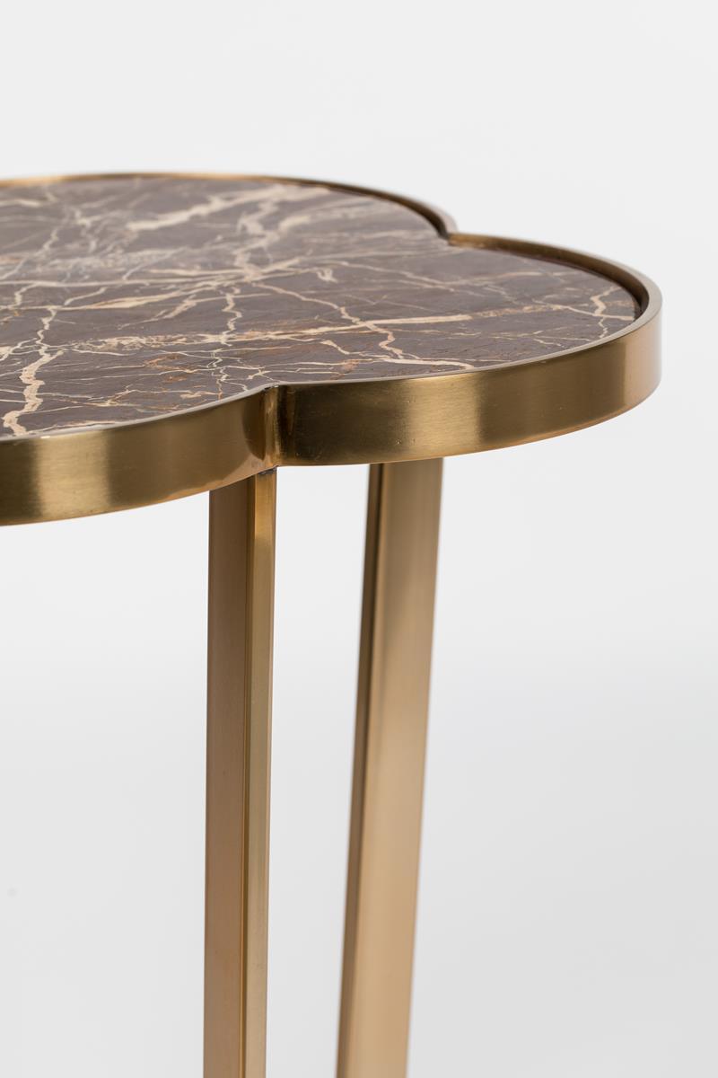 The side table IT's Marblelicious is the answer of Bold Monkey to the classic question "something is missing here". This side table with a marble top will add personality to any room. The striking, minimalist design is connected to the subtle art deco style. The marble surface of the table and brass legs perfectly match the soft furniture with the texture, and the shape in the art deco style is a beautiful contrast for modern spaces.