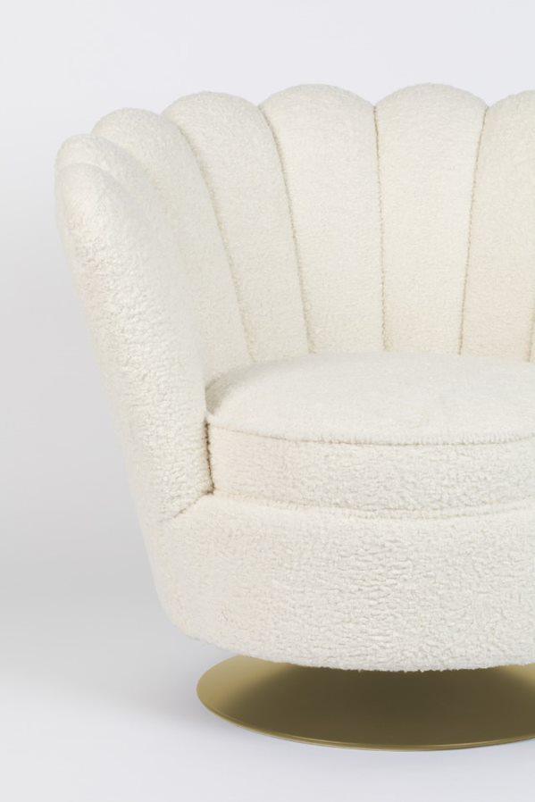 Wherever you put it, the Bold Monkey Mother of All Shells chair catches your attention. Upholstered in a rich natural texture in a plush color, the elegant style of the 70s is finished with gold-covered gold base.