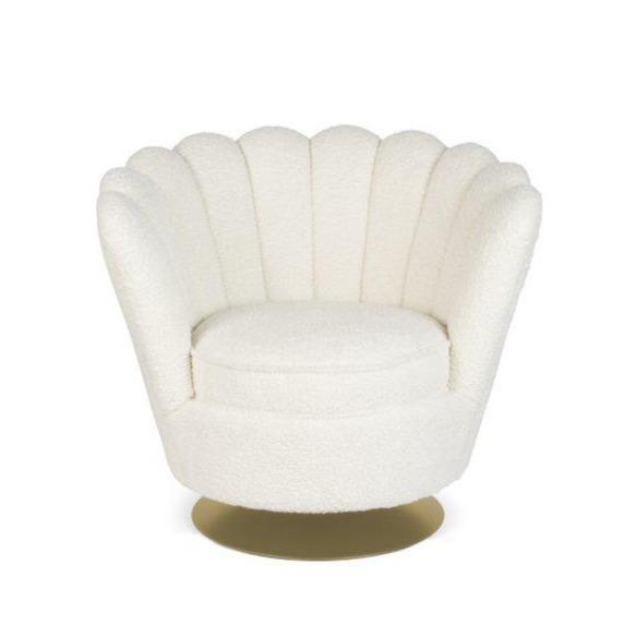 Wherever you put it, the Bold Monkey Mother of All Shells chair catches your attention. Upholstered in a rich natural texture in a plush color, the elegant style of the 70s is finished with gold-covered gold base.