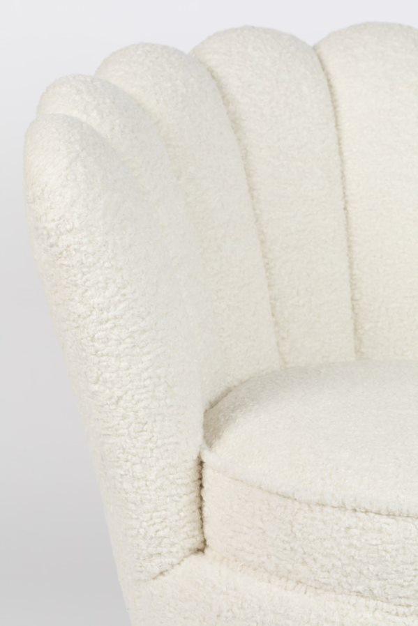 Wherever you put it, the Bold Monkey Mother of All Shells chair catches your attention. Upholstered in a rich natural texture in a plush color, the elegant style of the 70s is finished with gold-covered gold base.